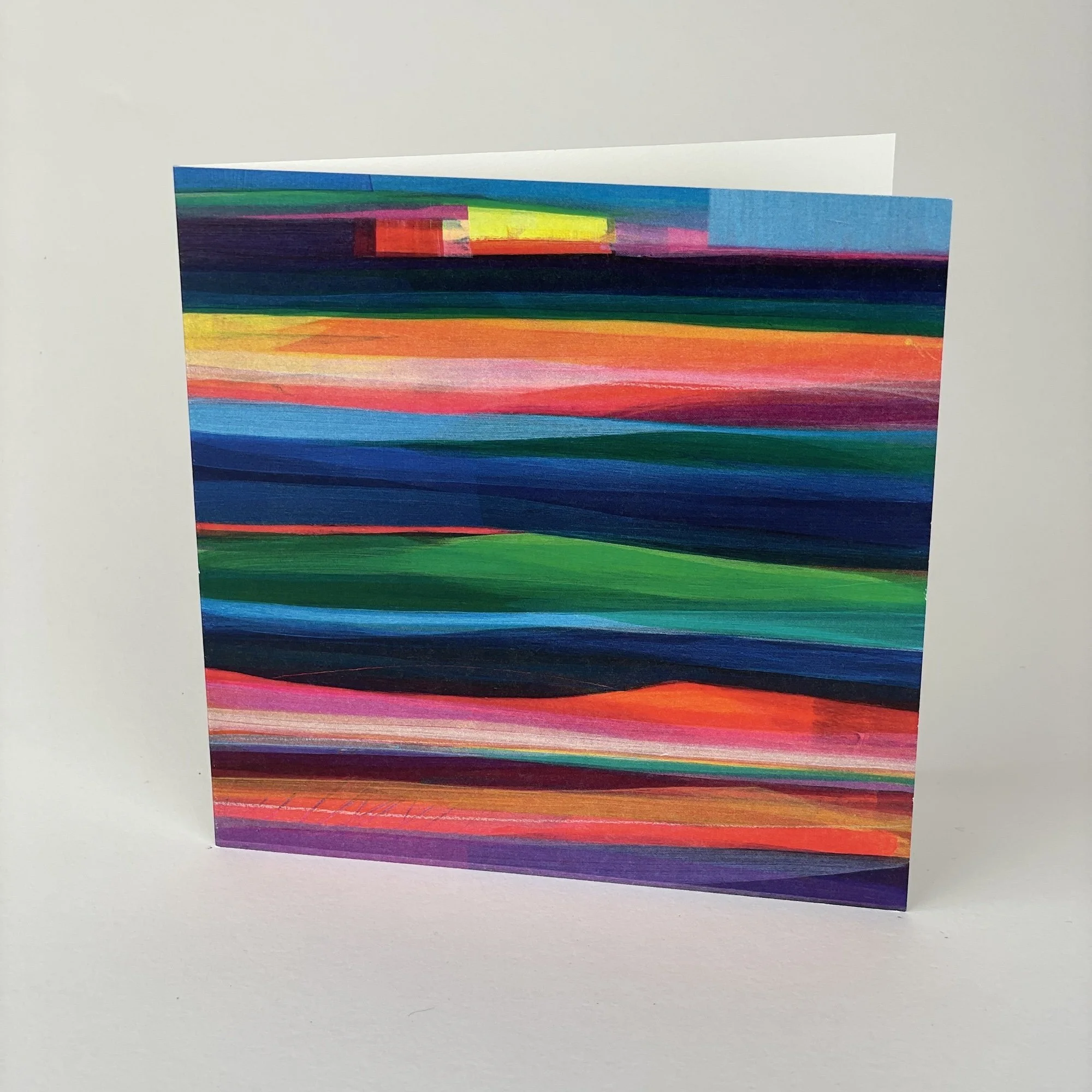 Contemporary fine art landscape greeting card with colourful abstract hills and sky