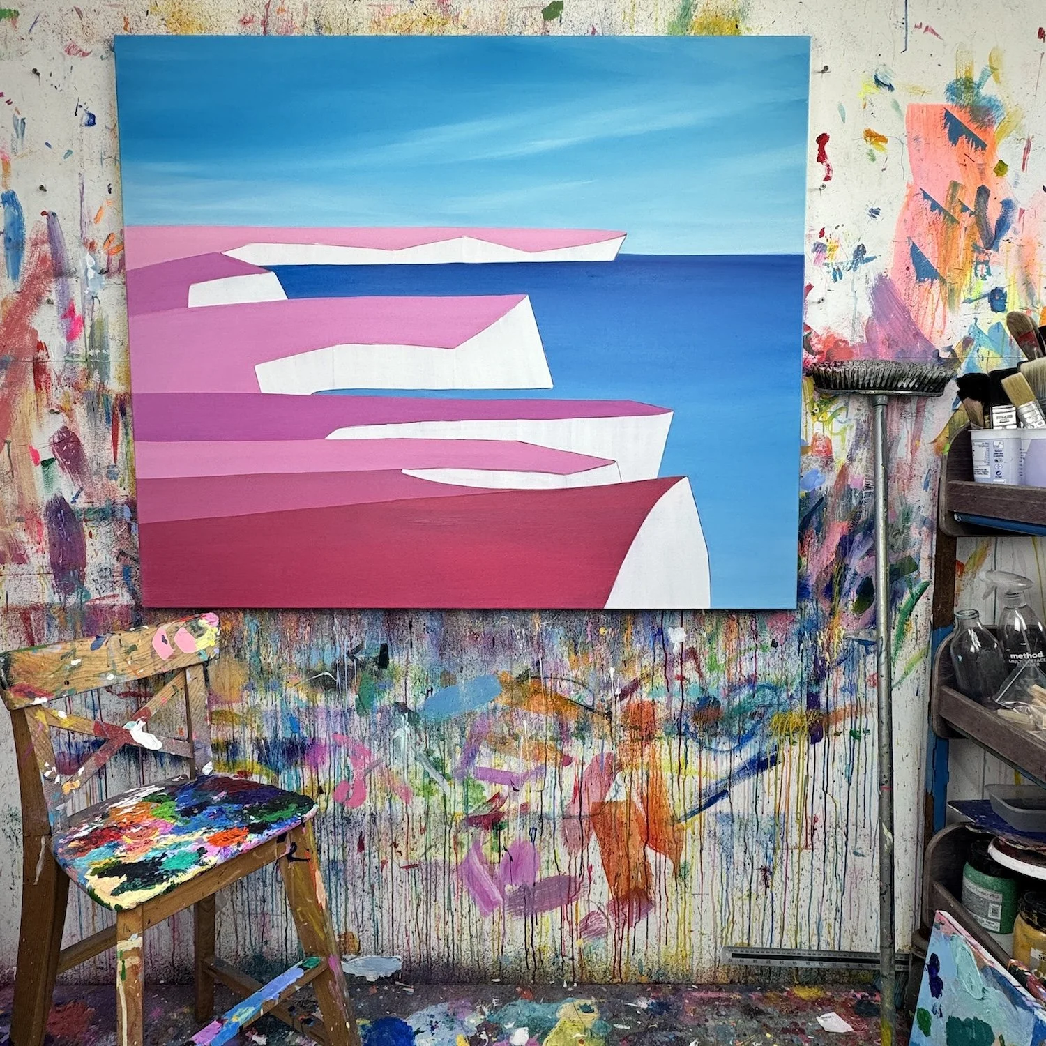 Large statement seascape painting with cliffs and expansive sky