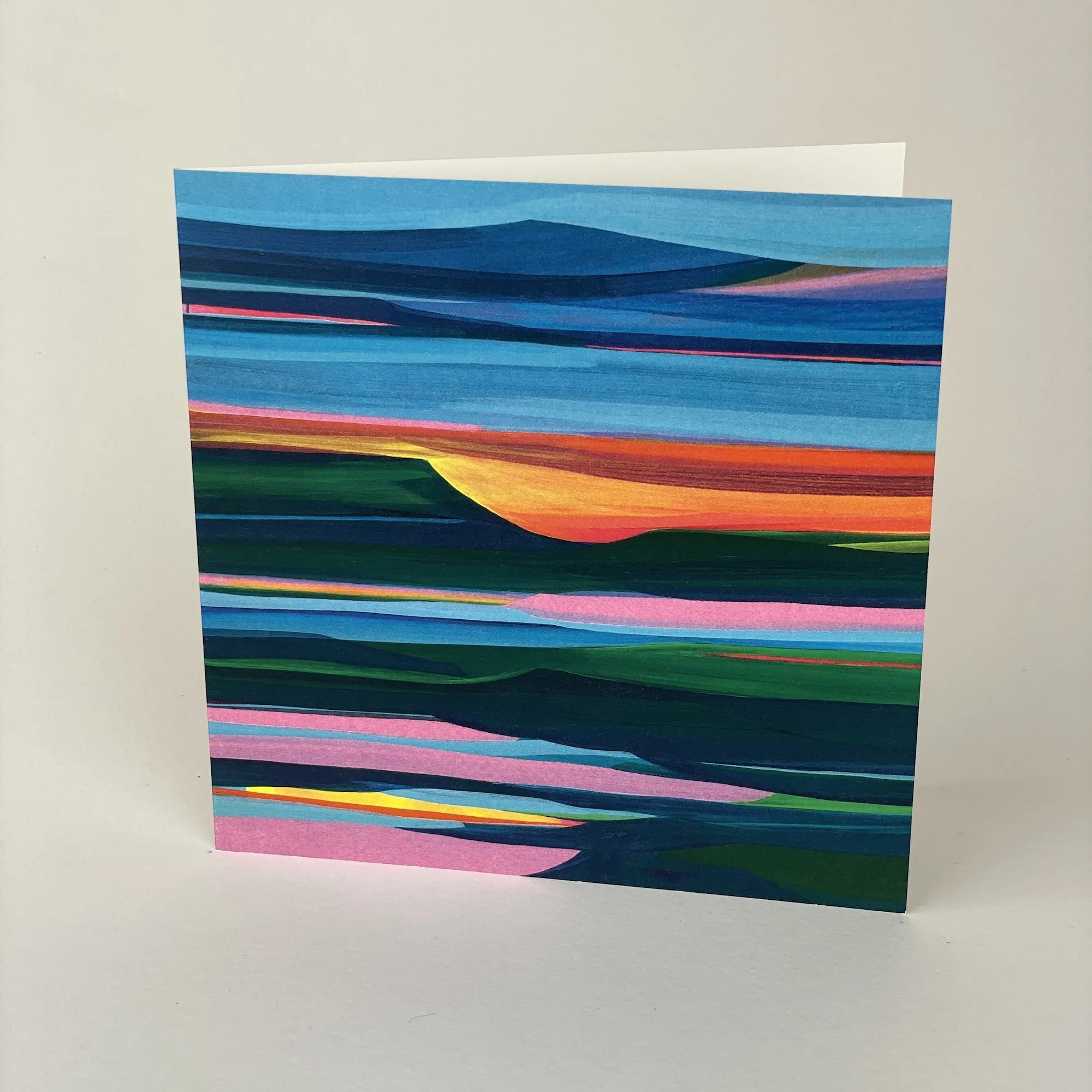 Colourful countryside fine art greeting card with abstract fields and skies, modern art design