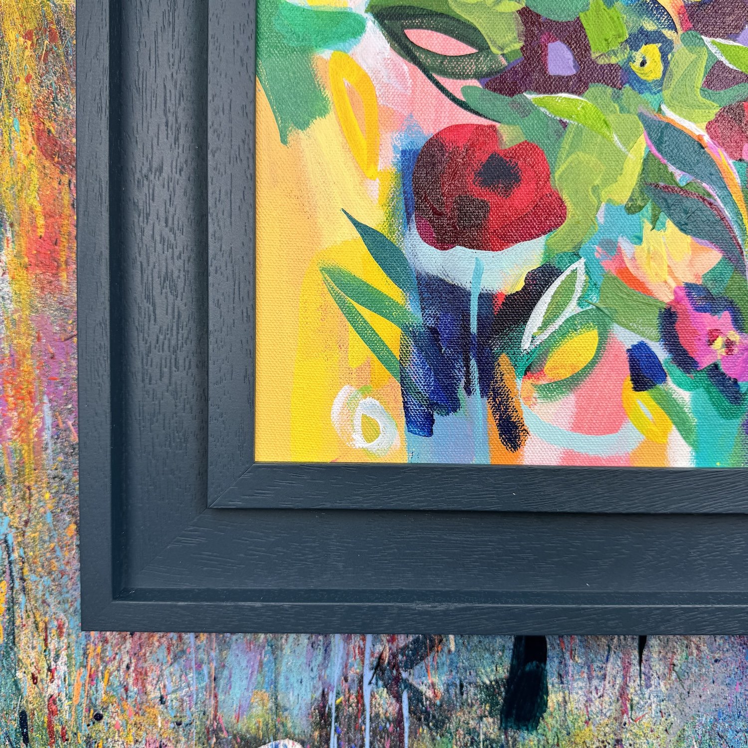 Close-up of bright blooms and green leaves in textured painting