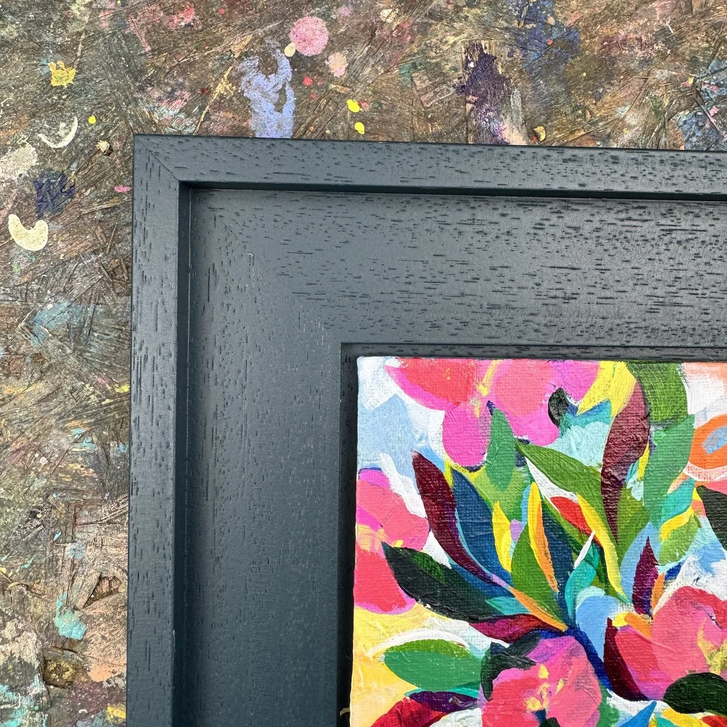 Detail of layered colour in warm-toned floral artwork
