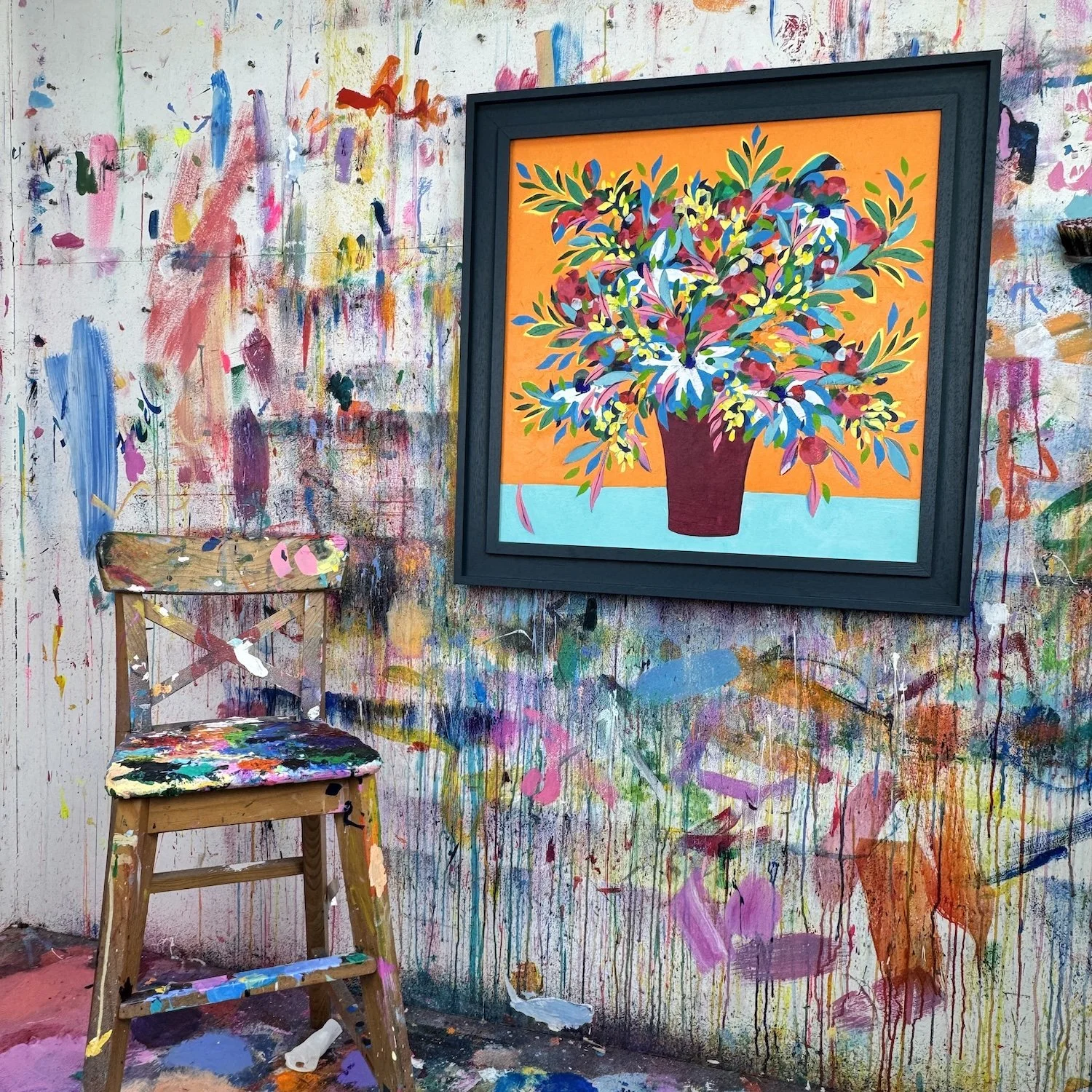 A floral painted by Faye Bridgwater hanging in her studio