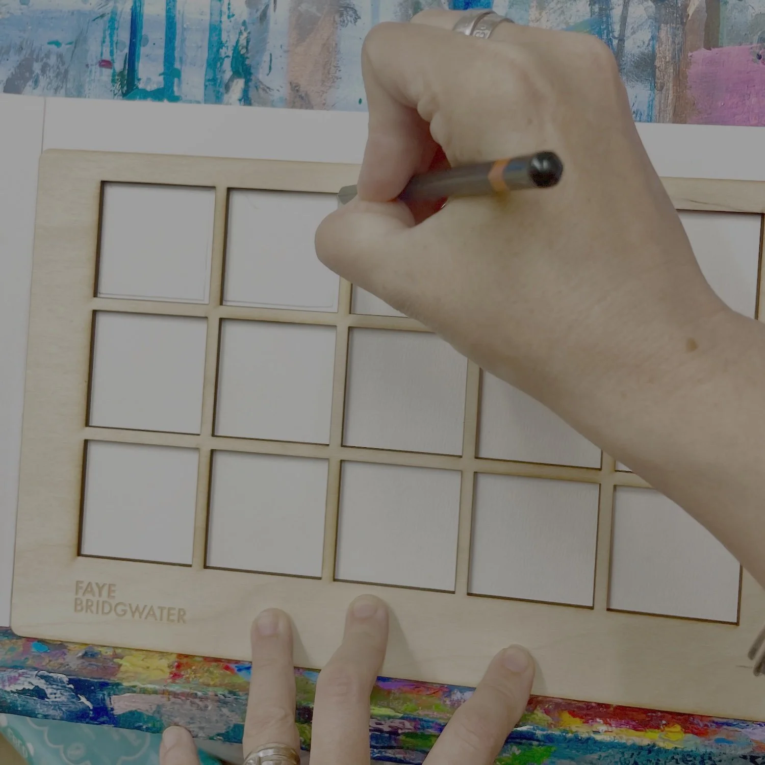 Artist using Sketch Squares drawing tool to explore ideas and develop a page