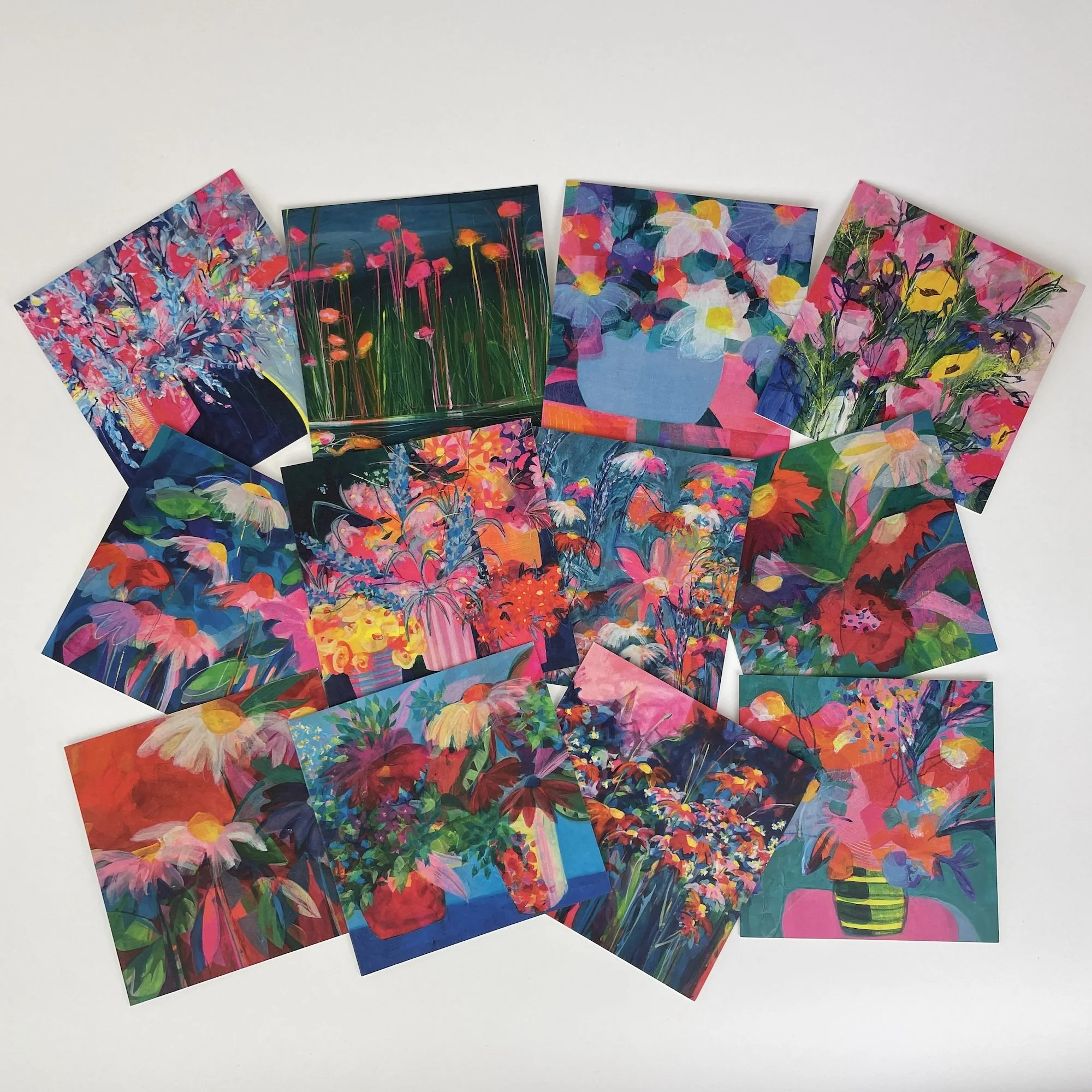 Contemporary floral greeting card by British artist Faye Bridgwater featuring bold colourful painted flowers, blank inside