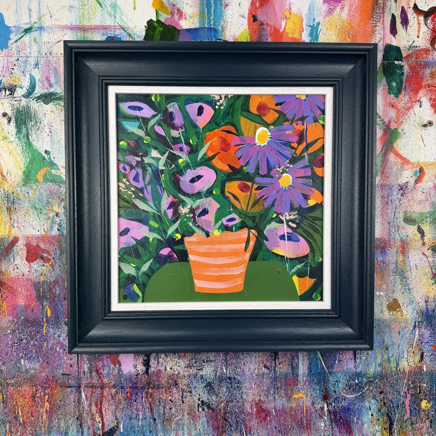 Green painting with notes of purple and orange in this bold contemporary artwork