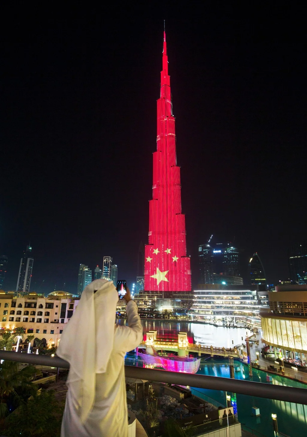 The Burj Khalifa in Dubai lit up in the colours of the Chinese flag to mark President Xi's visit last week. Source: The National (CC)