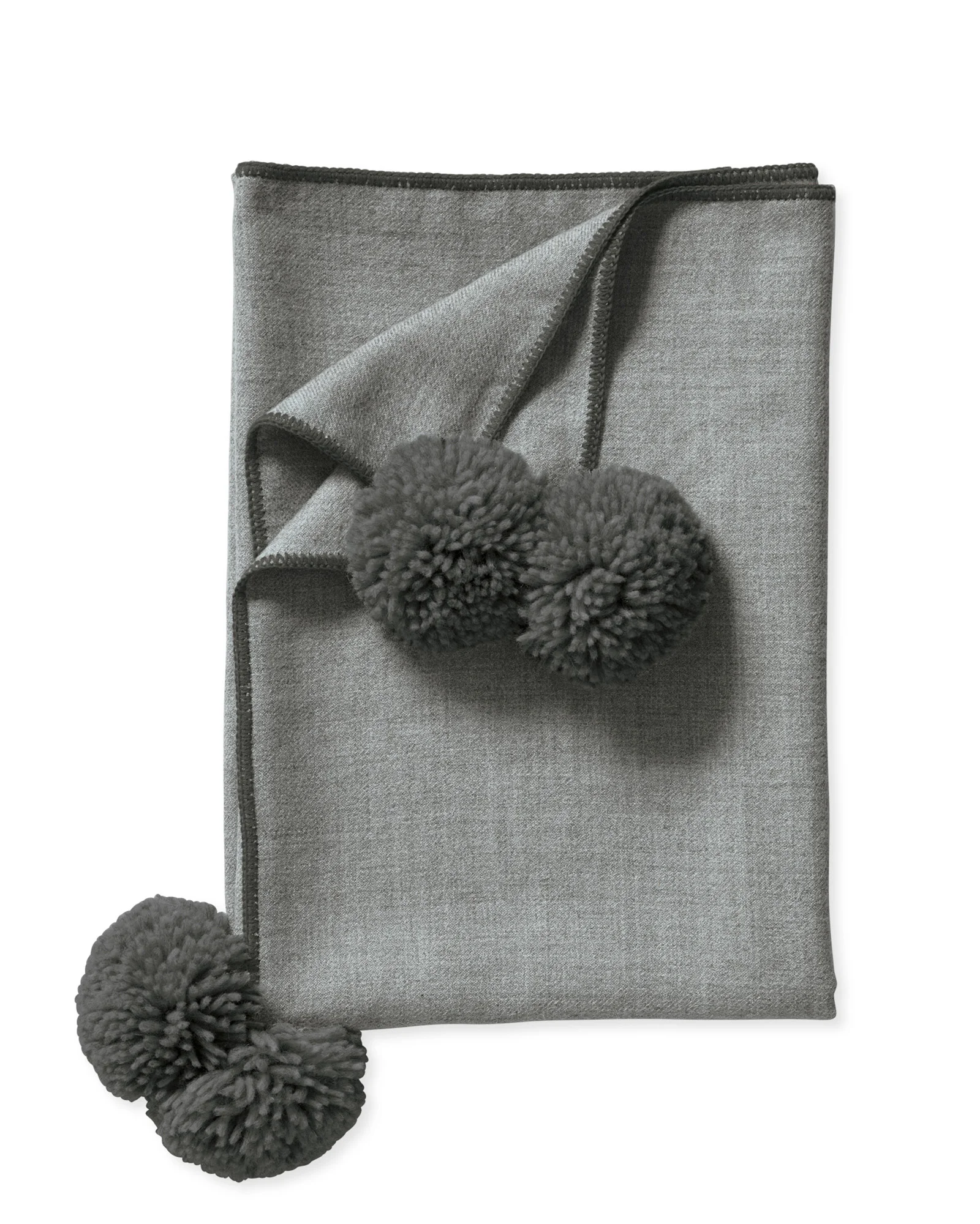Alpaca wool and oversized pom-poms. Need we say more?!