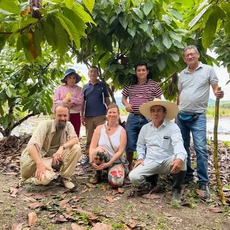 Group of people in a cacao forest, Diana and Alku, cacao farmers, Aynua Cacao, Amazonas, Peru