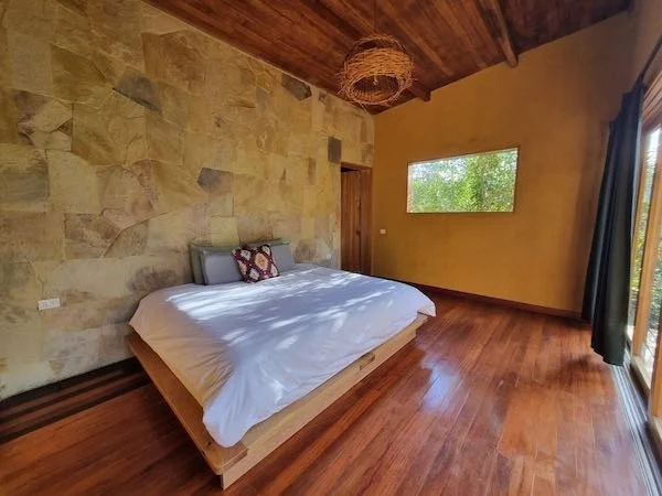 Bedroom in a deluxe eco-lodge cabin, cacao diet retreat, Gocta, Aynua Amazonas, Peru