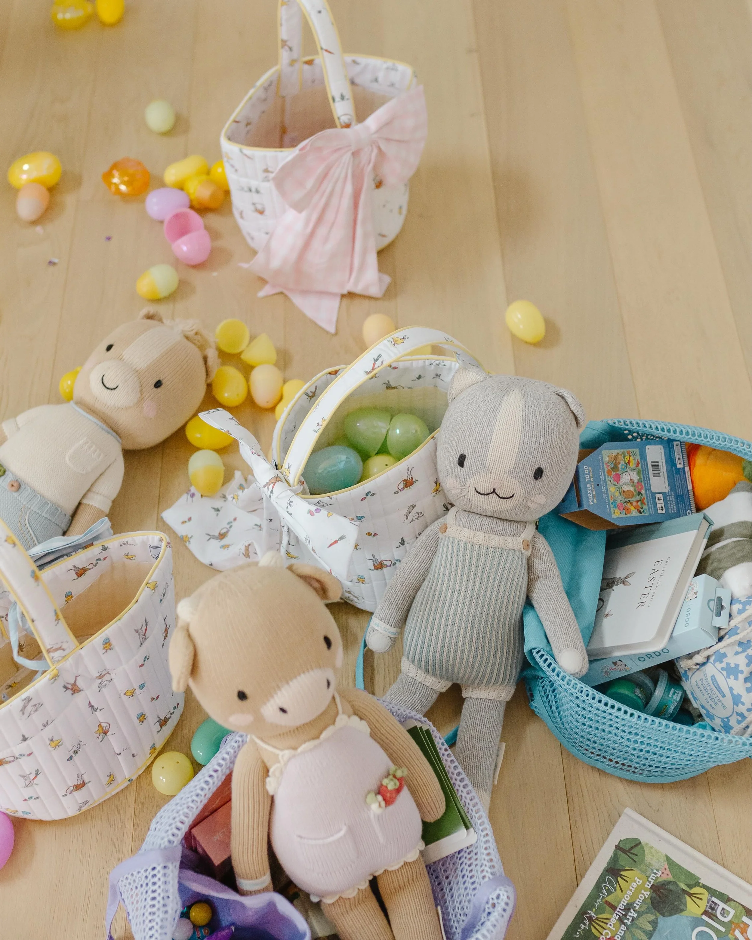 forever obsessed with curating Easter baskets (also forever obsessed with @cuddleandkind dolls) - question: does anyone else have a colour assigned to each kid? big fan of colour coding things over here. This year the kids had to find their Easter ba