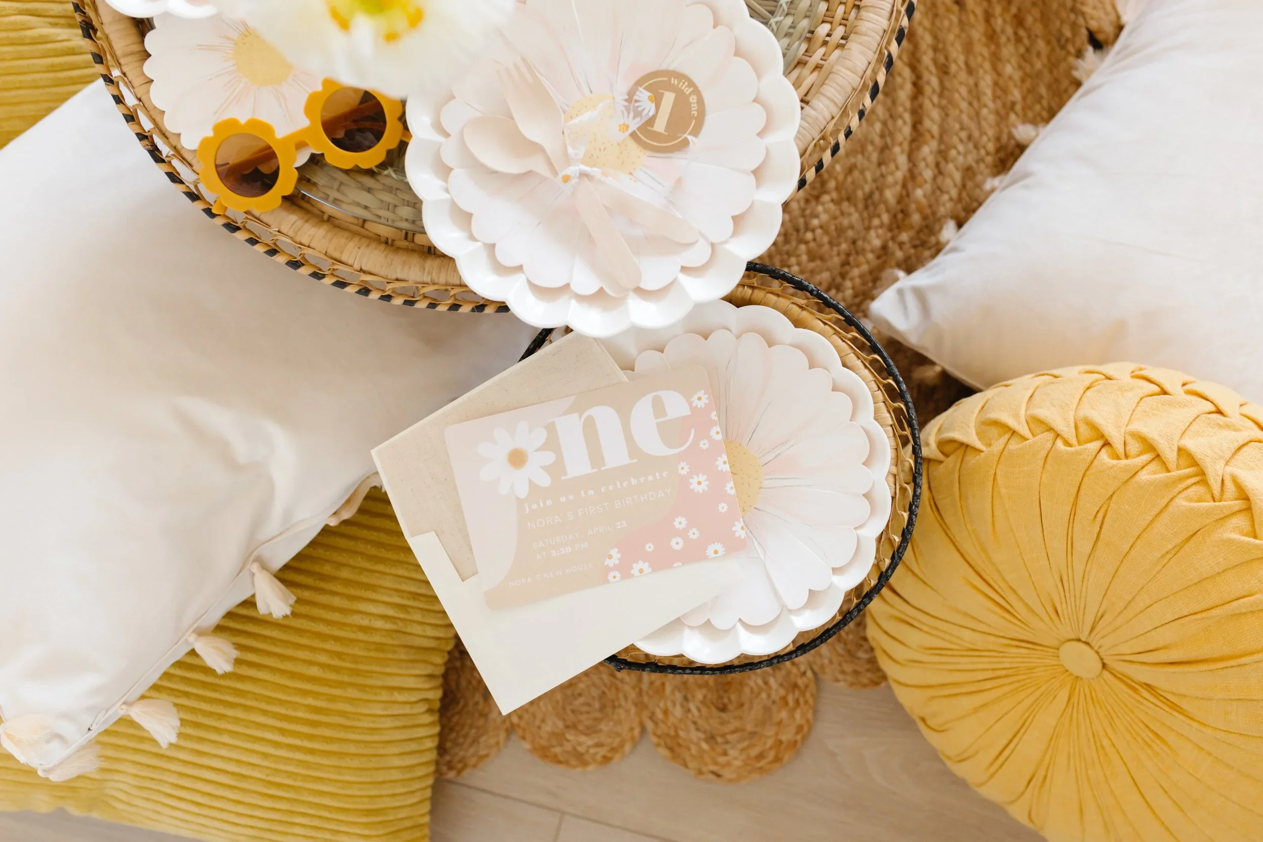 Invitation card for a DAISY themed first birthday party 