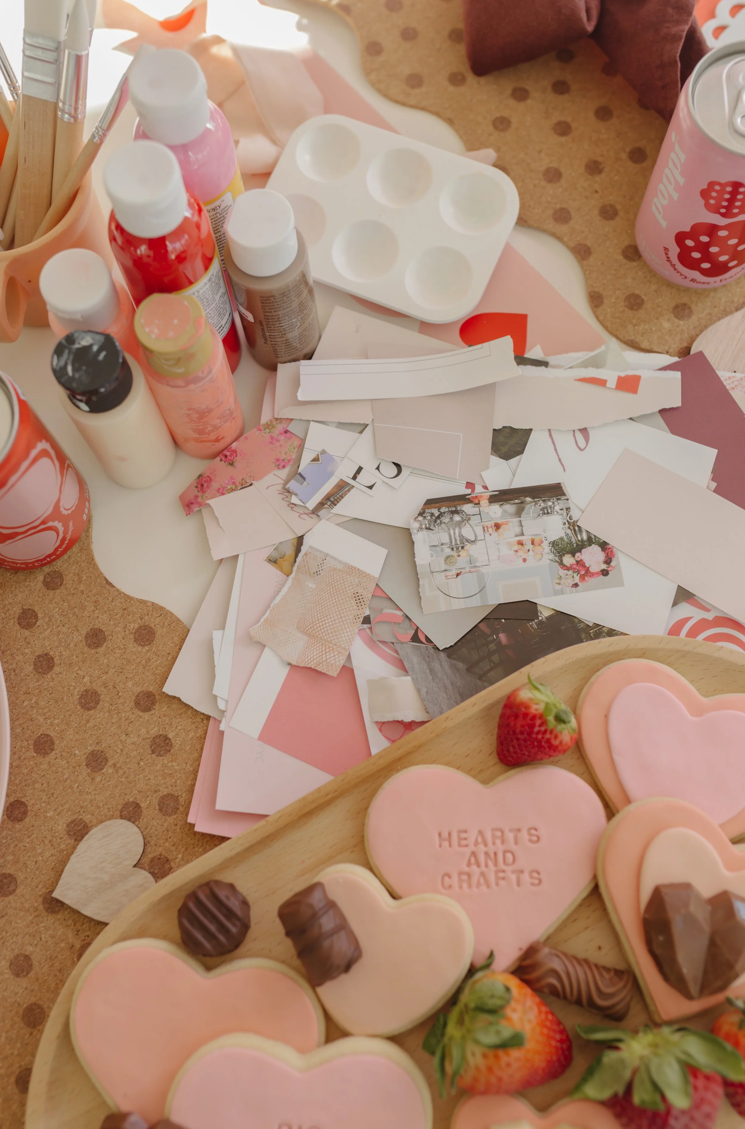 valentines day junk journal aesthetic, magazine cut outs for collage project, paints and valentines day pink fondant stamped cookies - galentines day Hearts and Crafts party setup