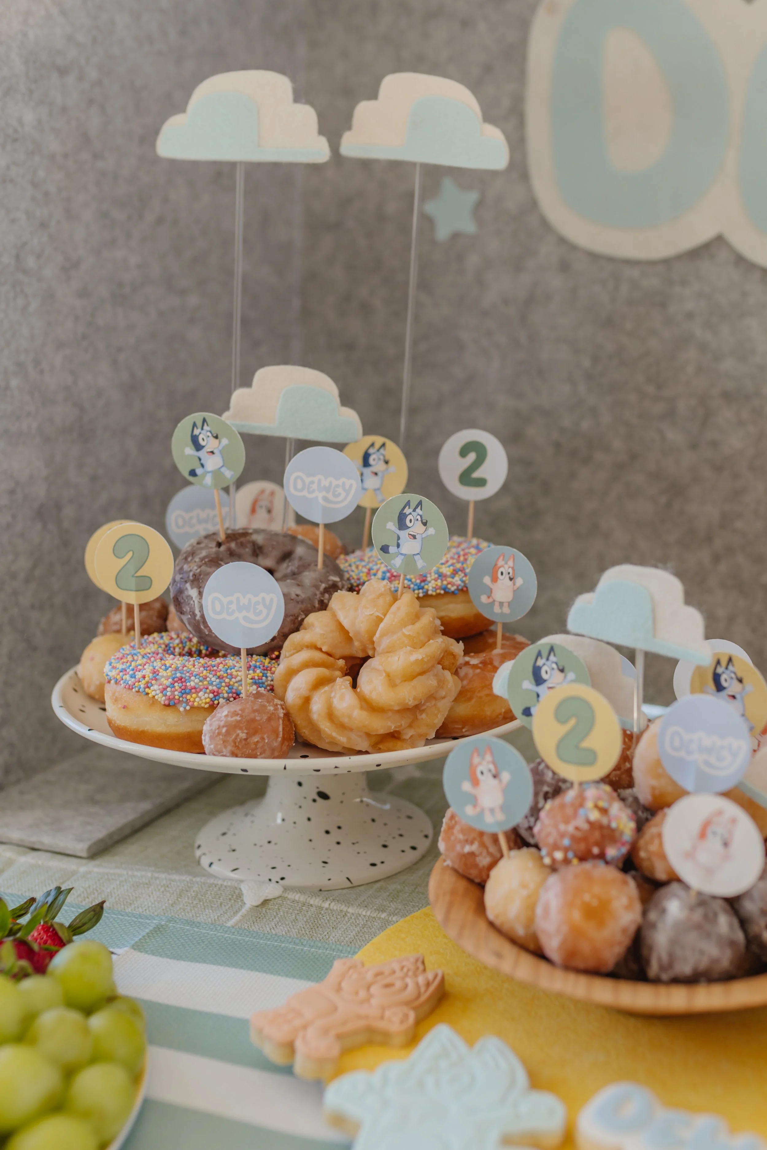 hand drawn bluey and bingo illustrations on printable treat, cupcake or cake toppers for bluey themed birthday party. DIY print your own party decor!