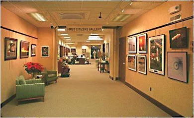 First Citizens State Bank 207 West Main Street, Whitewater, WI 53190 Hours Monday-Thursday 8:30-5:00, Friday 8:30-6:00 Saturday 8:30 to 12:00pm First Citizens State Bank is a community bank with its roots dating back over 140 years. In the spring of 2005 we created the First Citizens Gallery and Coffee Nook in the hallway joining the original building with the new addition. This space is dedicated to showcasing the artwork of area artists. We would be delighted to have you stop by to view the artwork and enjoy a cup of coffee or tea. If you would like to display your artwork, please contact Penny Ardelt: 262-473-2112