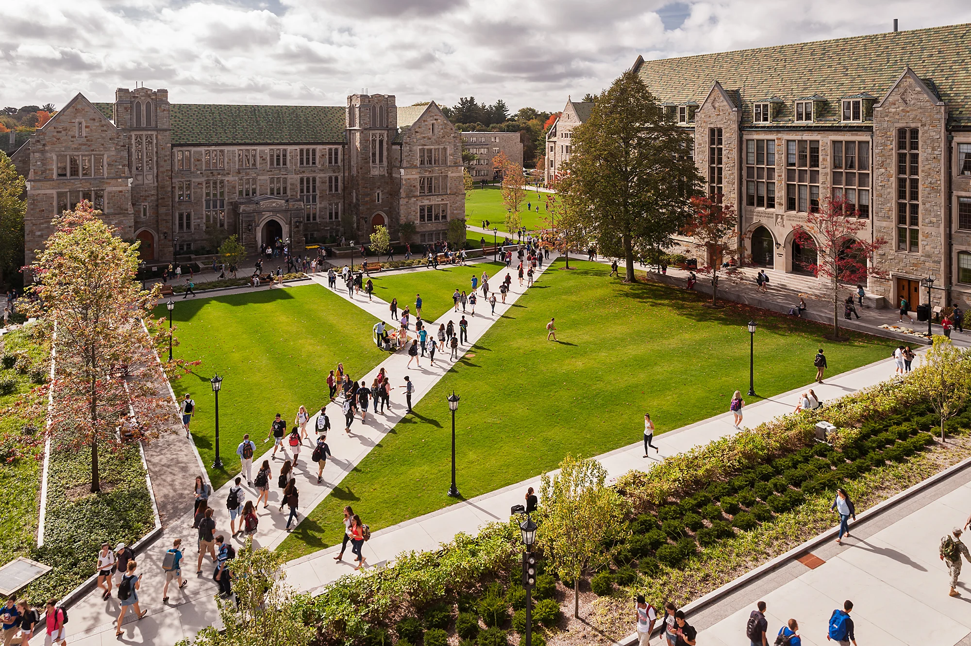 In 2010, STIMSON started working with Boston College on a landscape Master Plan for its Historic Middle Campus. This plan was implemented in a series of projects over the course of four years. The resulting three acres landscape of pathways and courtyards creates a coherent identity for the core of this historic campus. Our new plan eliminates vehicular traffic from the center of the campus, accommodates the college’s major student circulation artery which channels 10,000 students through middle campus, puts in place a series of sustainable initiatives, creates a canopy structure of large native trees, and provides spaces for major campus events as well as quiet contemplation. The new landscape also reestablishes key features of the 1909 plan which envisioned the entire campus as linked quadrangles forming a vast cathedral of trees to celebrate the Jesuit heritage of the College. Recognition Boston Society of Landscape Architects | Merit Award for Design 2019 Society for College and University Planning | Honor Award 2016 Collaborators Tsoi Kobus & Associates DiMella Shaffer Einhorn Yaffee Prescott Photography Christian Phillips Ngoc Doan