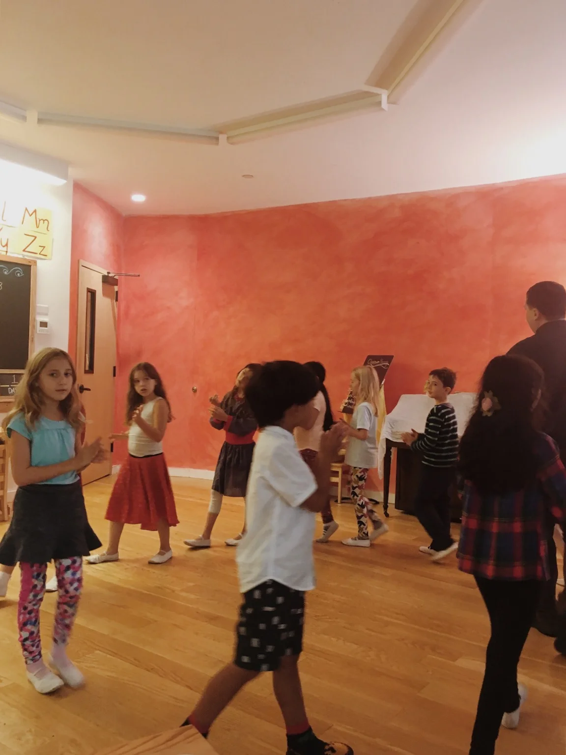Second and third graders learning Spanish through song