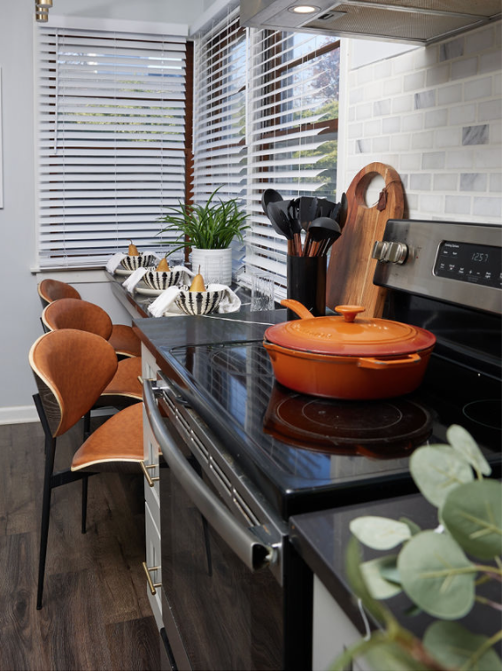 Tall kitchen oven and case iron skillet.png