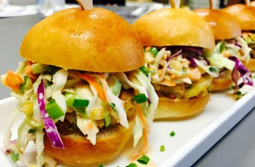 Crab+Cake+“Slider”+Topped+with+Pineapple+Jalapeno+Slaw+on+Mini+Brioche+Bun.jpg