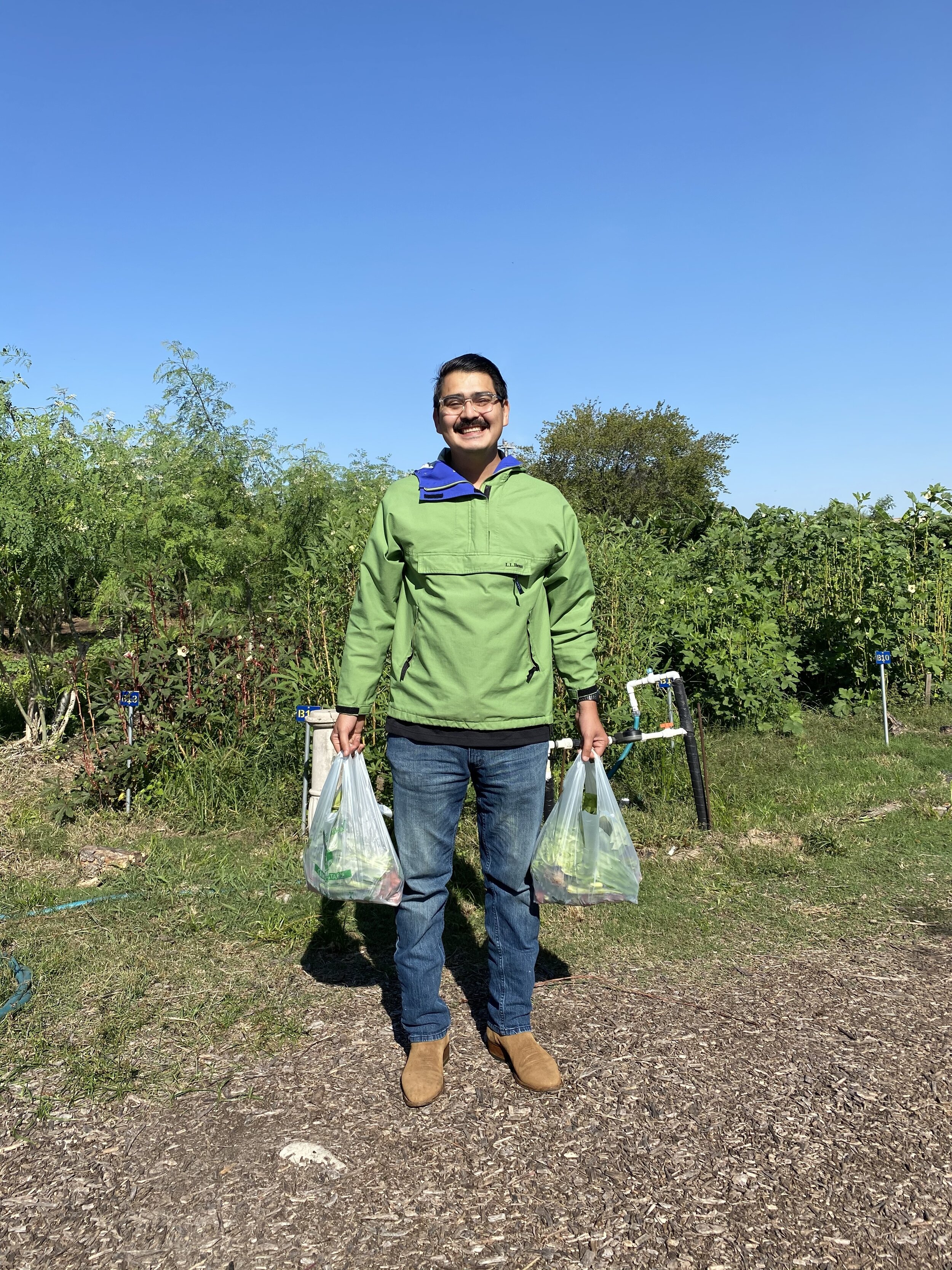 Jorge with Finca Donation bags!