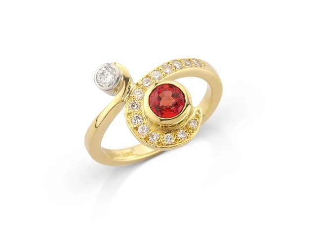 A dark beautifulpadparadscha sapphire and diamonds in 18ct gold