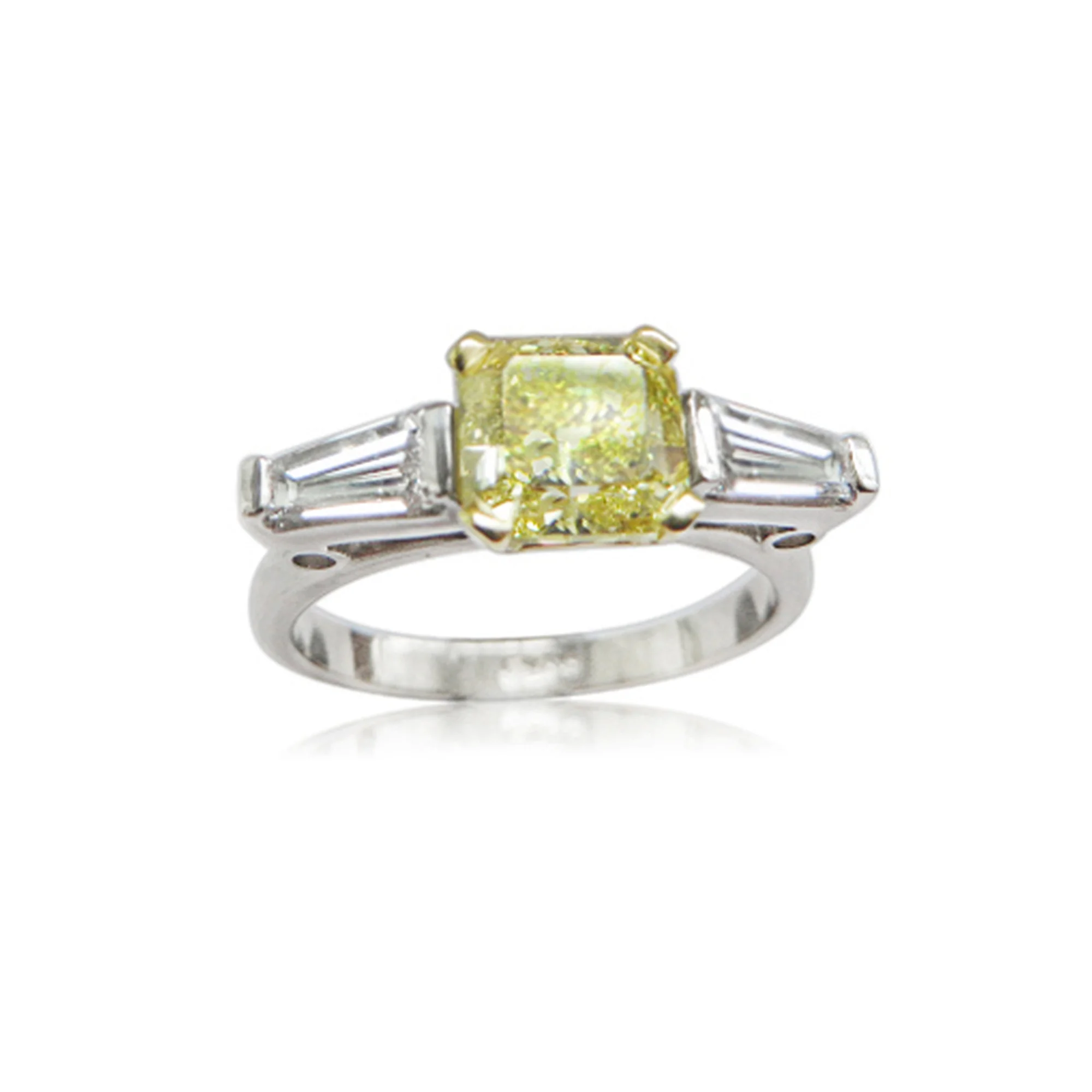 Wow so this is an Asscher cut internally flawless natural fancy vivid yellow diamond being 1.48 carats flanked by two D colour vvs1 quality tapered baguette diamonds total carat weight 35 points ,all stones sourced by QVJ and mounted by us in a hand made ring for a very lucky and lovely client she say yes........