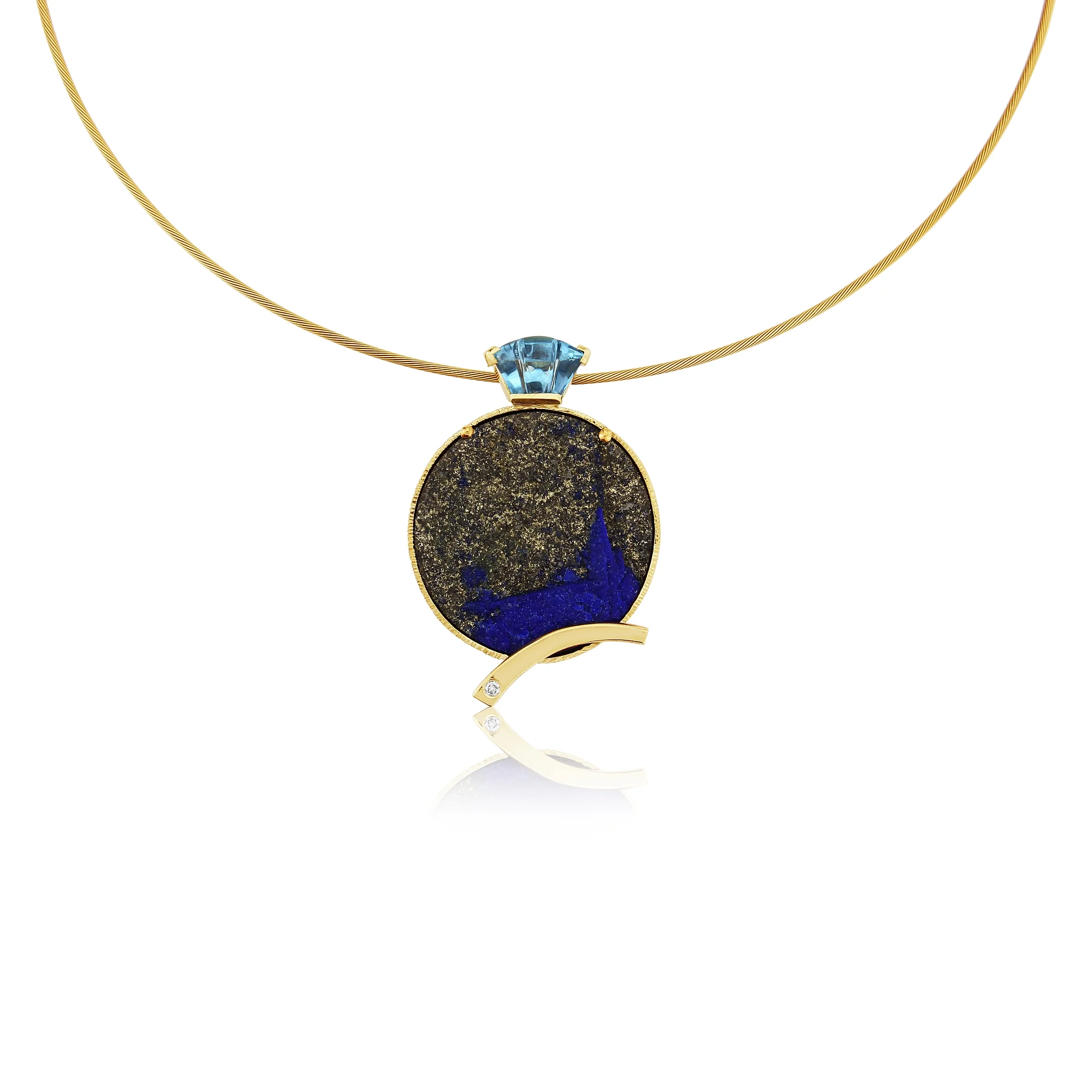 9ct Lapis in its rough state love the pyrite against the vibrant blue in this ,with a carved blue topaz as the bail with a diamond in the flash of gold .