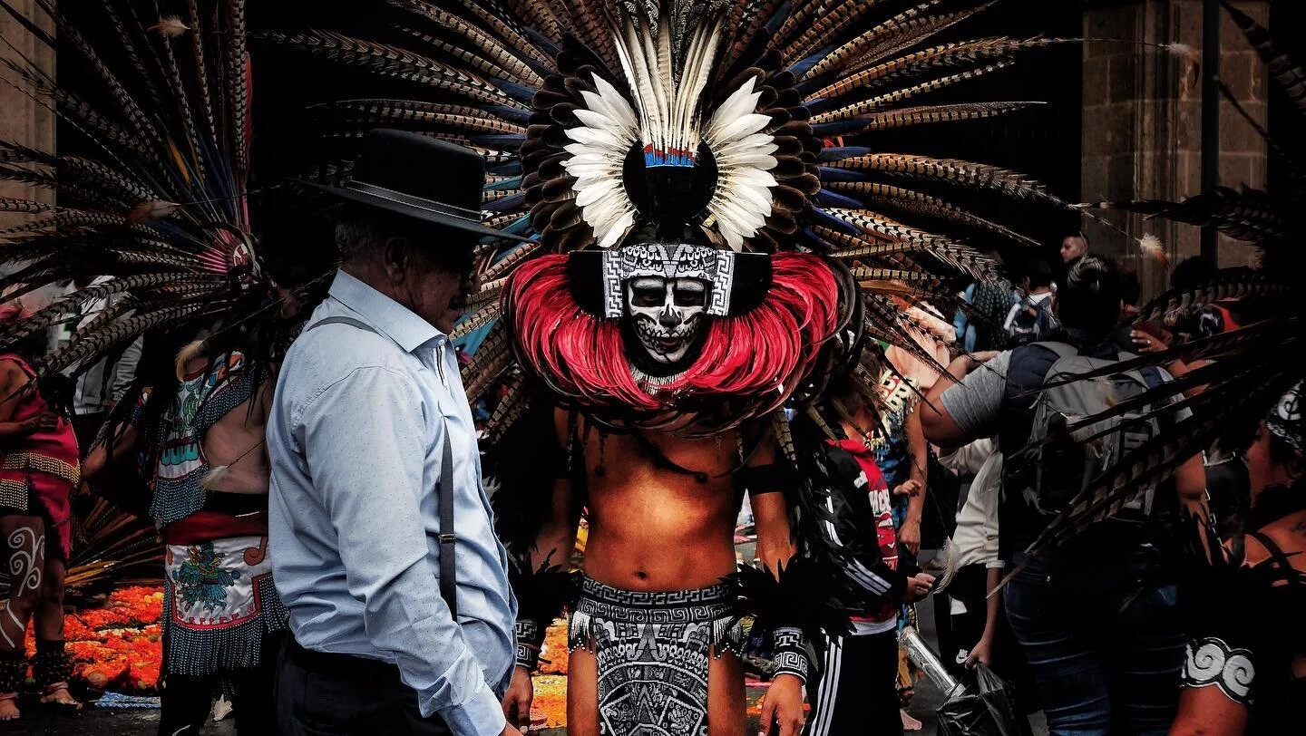 One of my favorite snaps so far during the dia de los muertos celebrations here in Mexico City. A candid street shot which blends the cultural old and new.  A combination of vibrant colors where you can also feel the semi-chaotic pulse of life that p