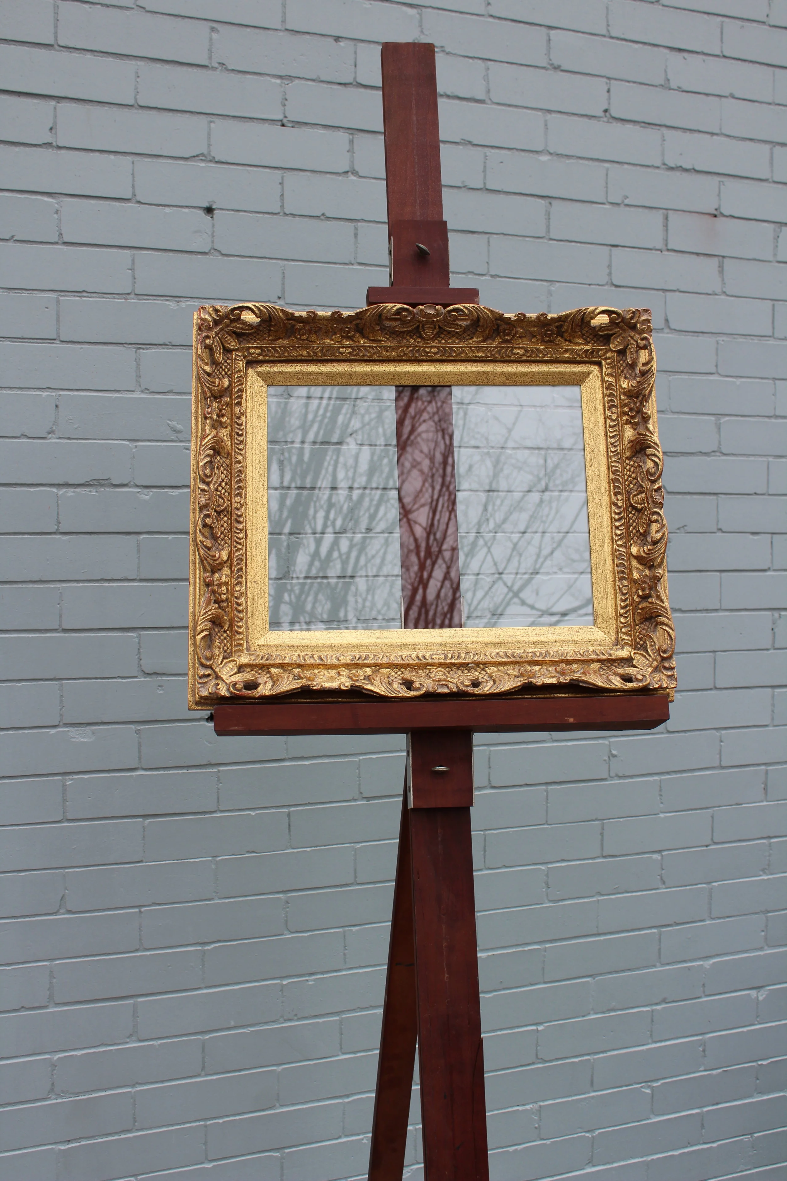 Glass: 14 x 11 Frame: 19.5" x 16" - Has a table top stand!