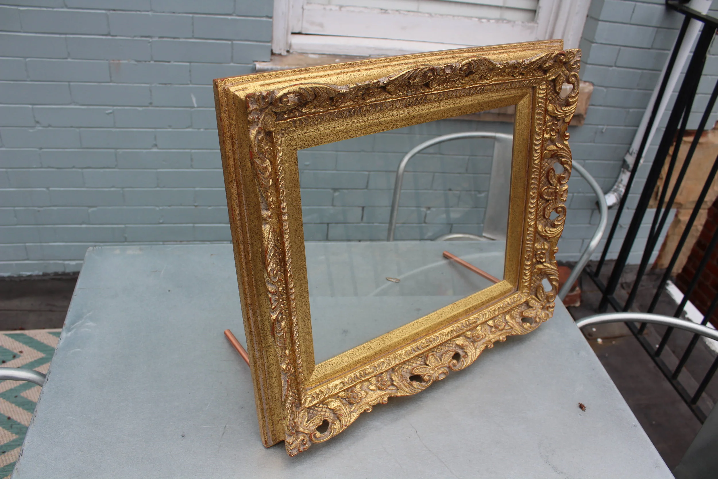 Glass: 14 x 11 Frame: 19.5" x 16" - Has a table top stand!