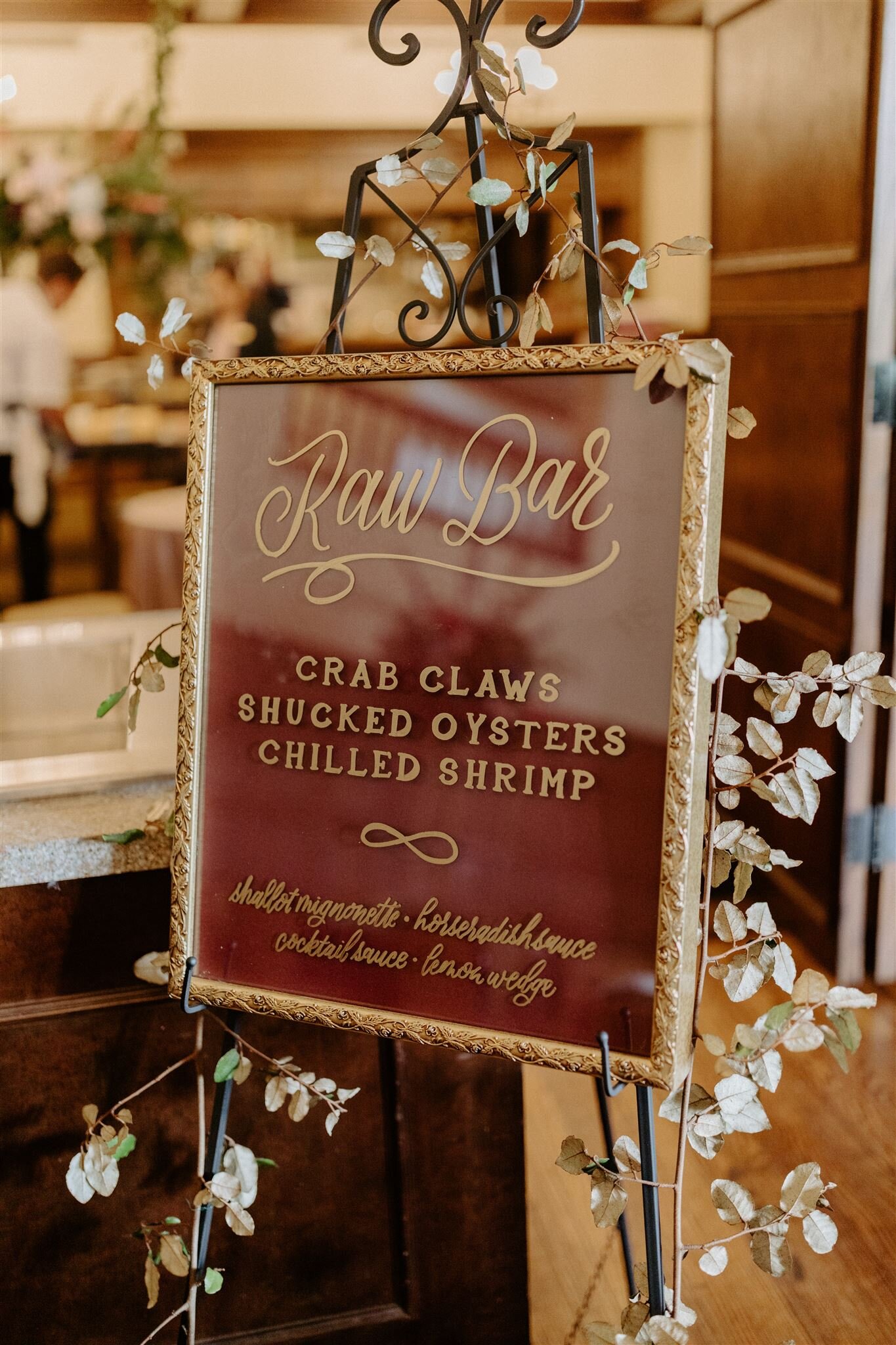 burgundy raw bar calligraphy sign