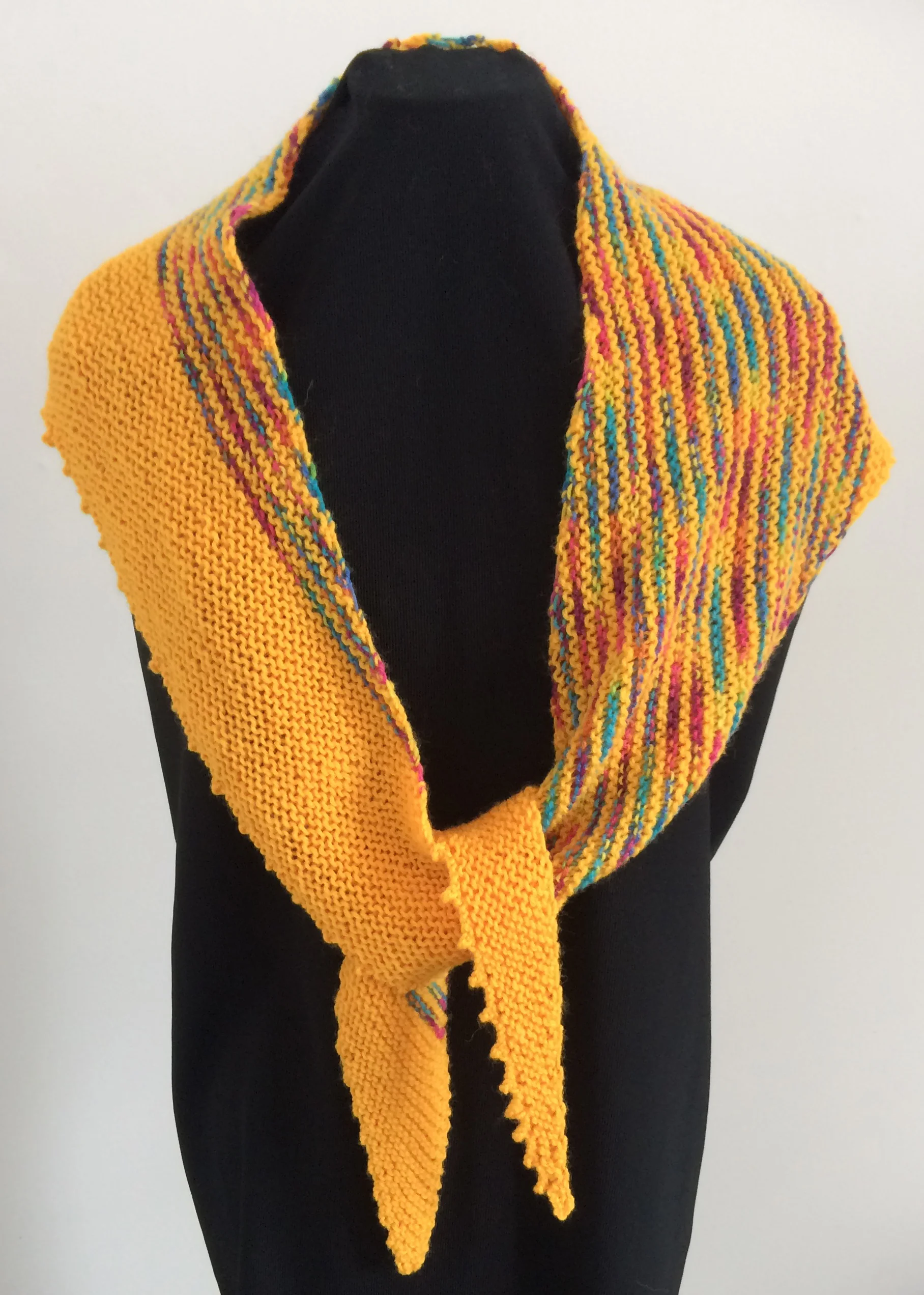 Cathryn Miller gold circus wedge shawl