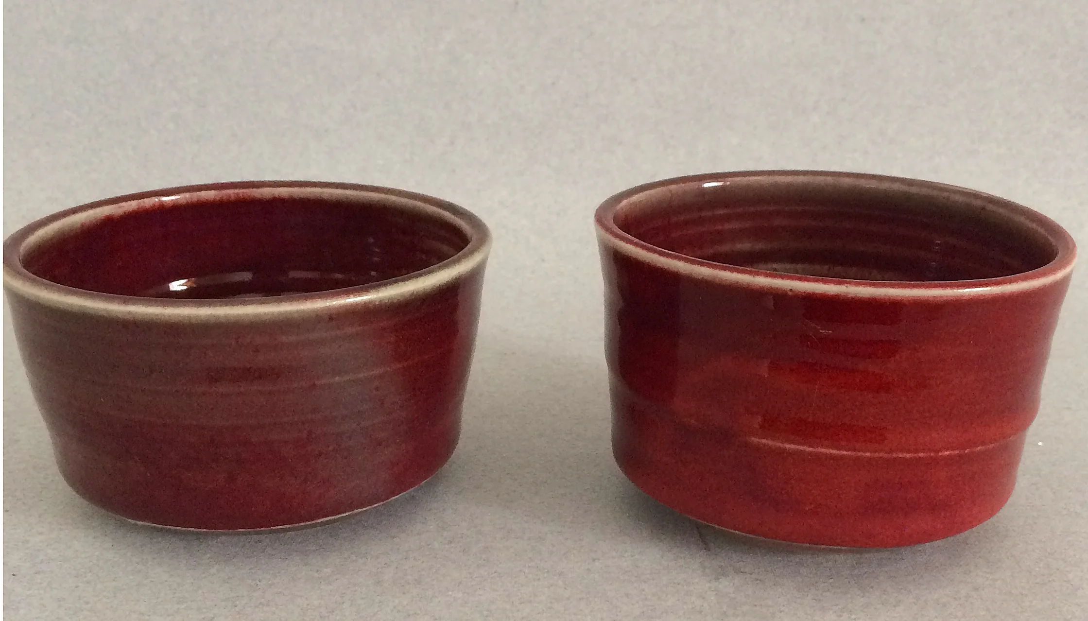 Gail Carlson small red dish (left)