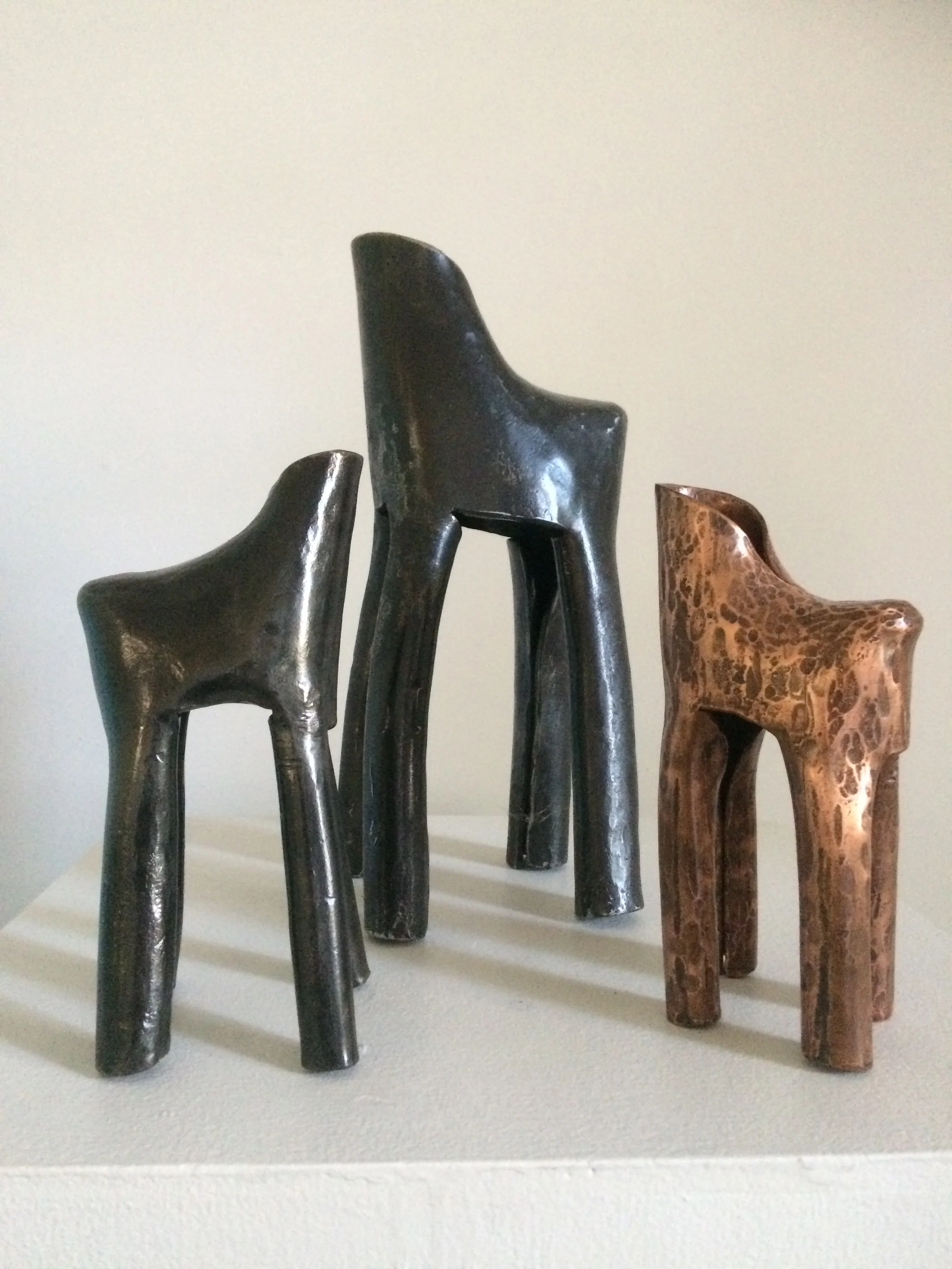 M. Craig Campbell small horse metal sculpture ( right)