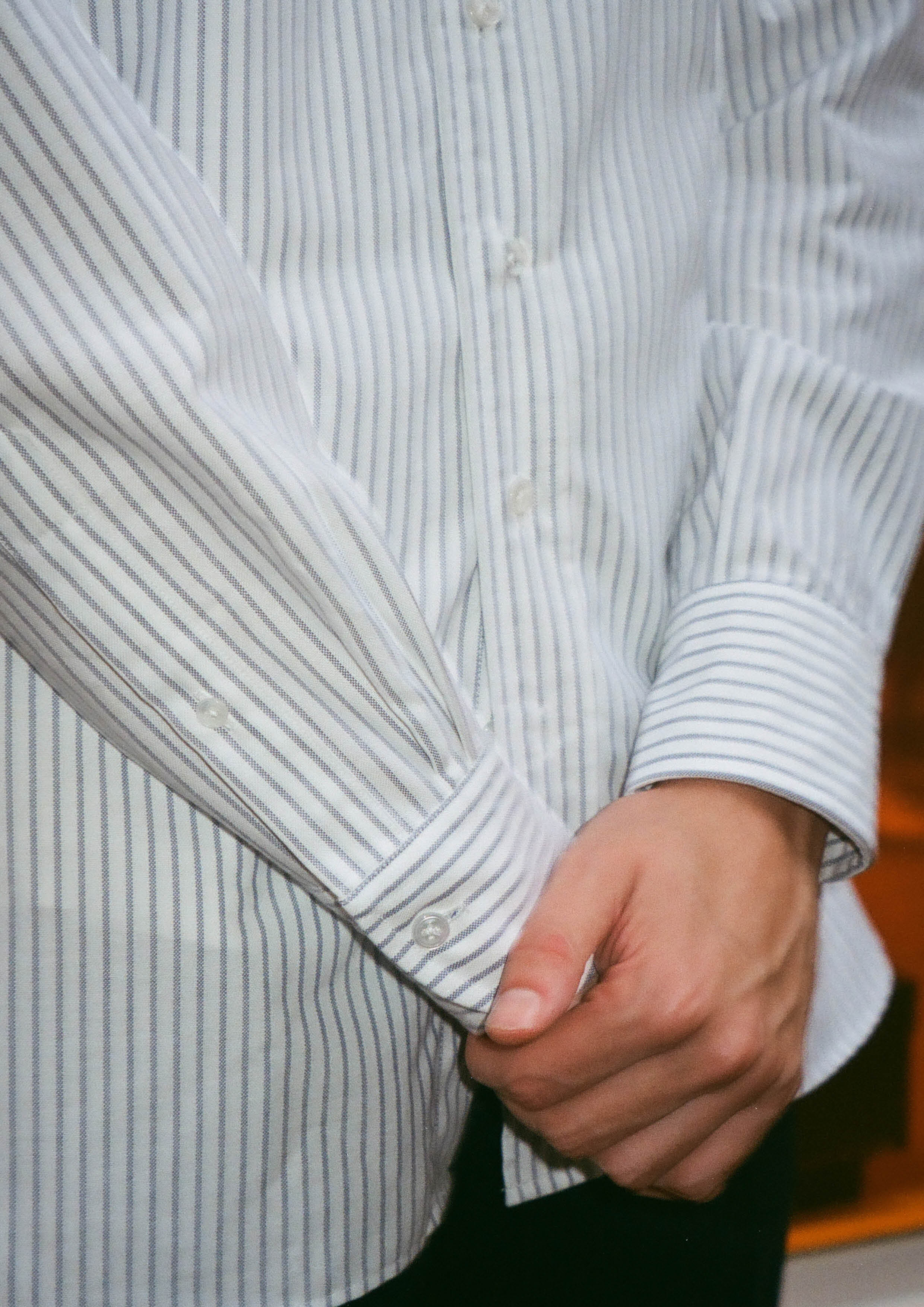 teal button down shirt