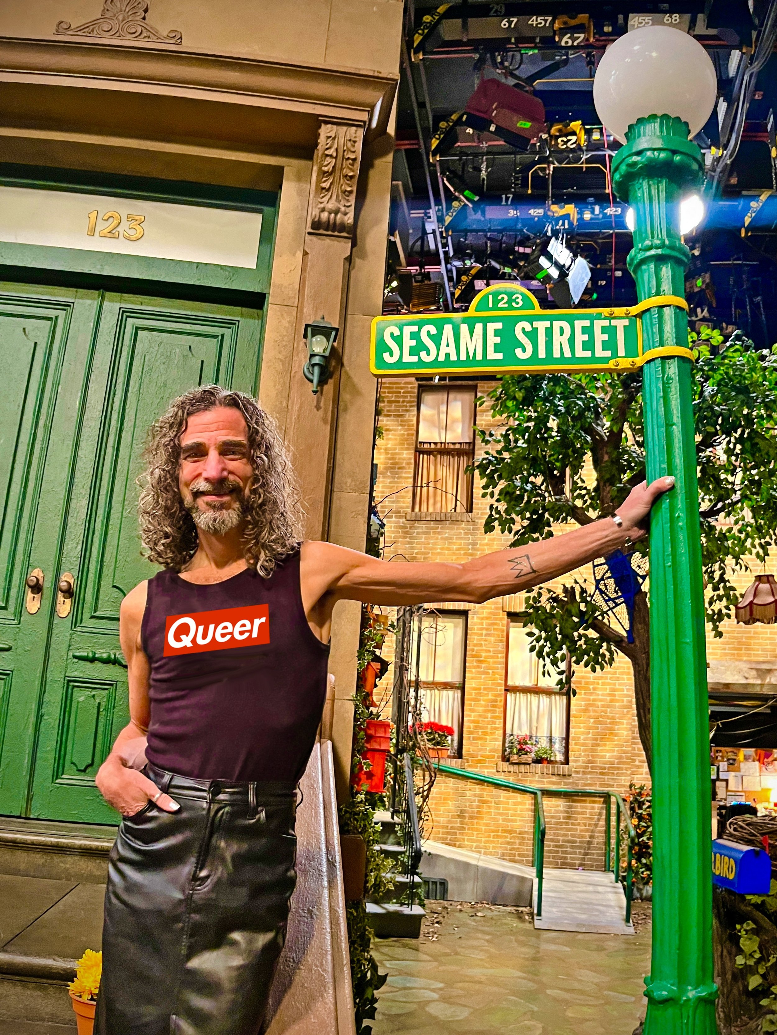 BRCSJ Chief Activist Robt Martin Seda-Schreiber * Queer on the stoop at Sesame Street.jpg