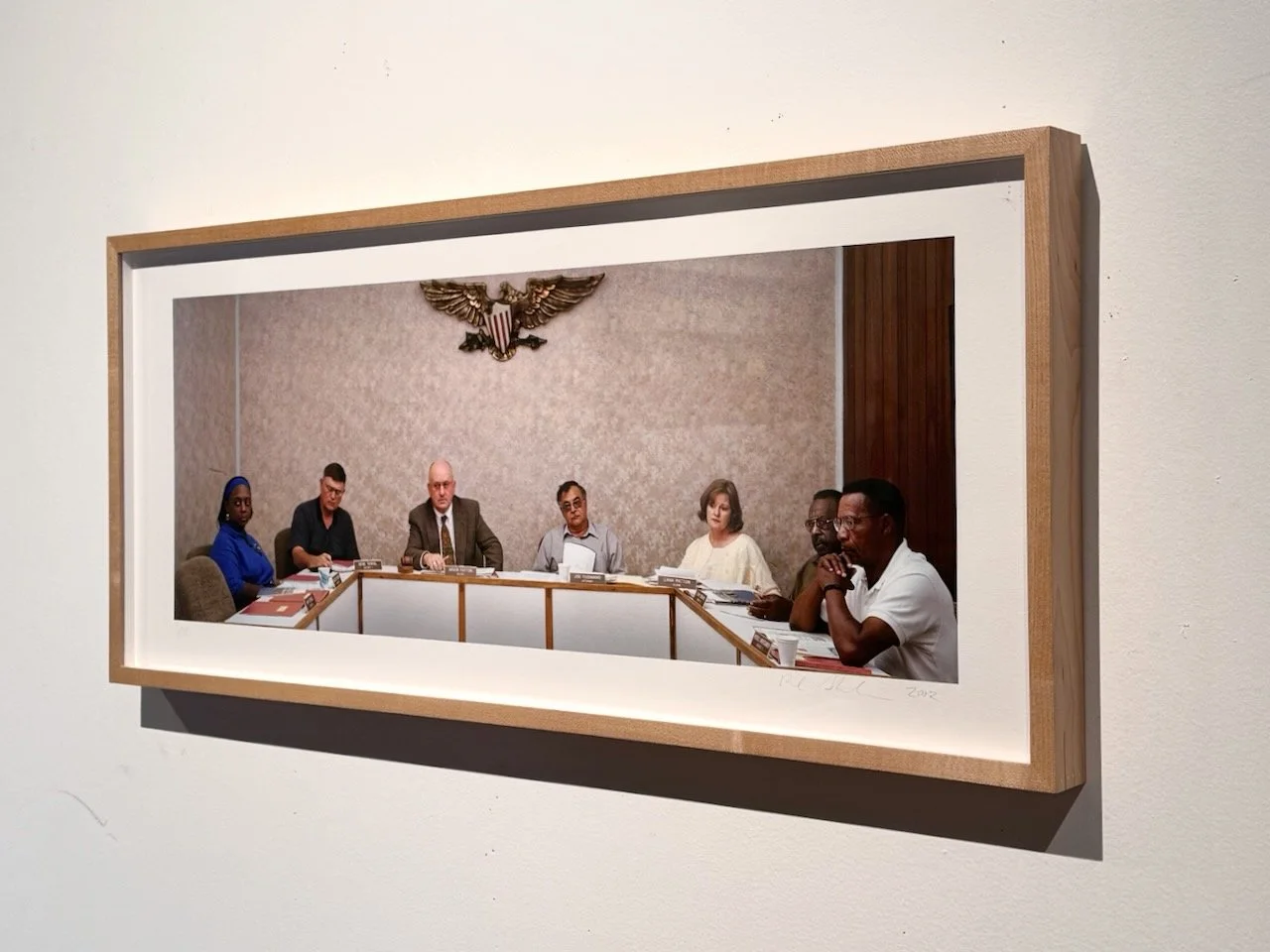 Maple framed "Meetings" limited edition print, 12X28 inches on paper. Includes signed "Meetings" book.