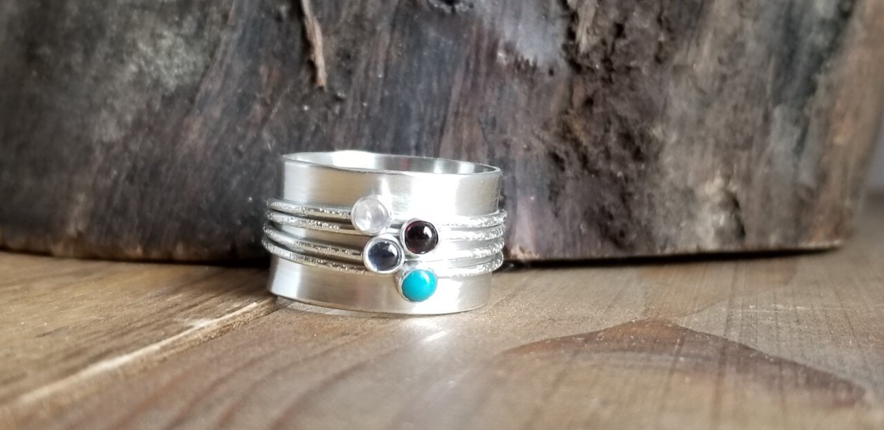 Mother's spinner ring with 4 birthstone spinners