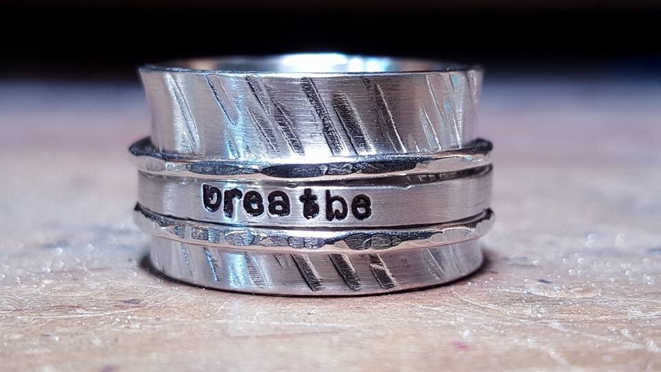 "Breathe" yoga flow spin ring