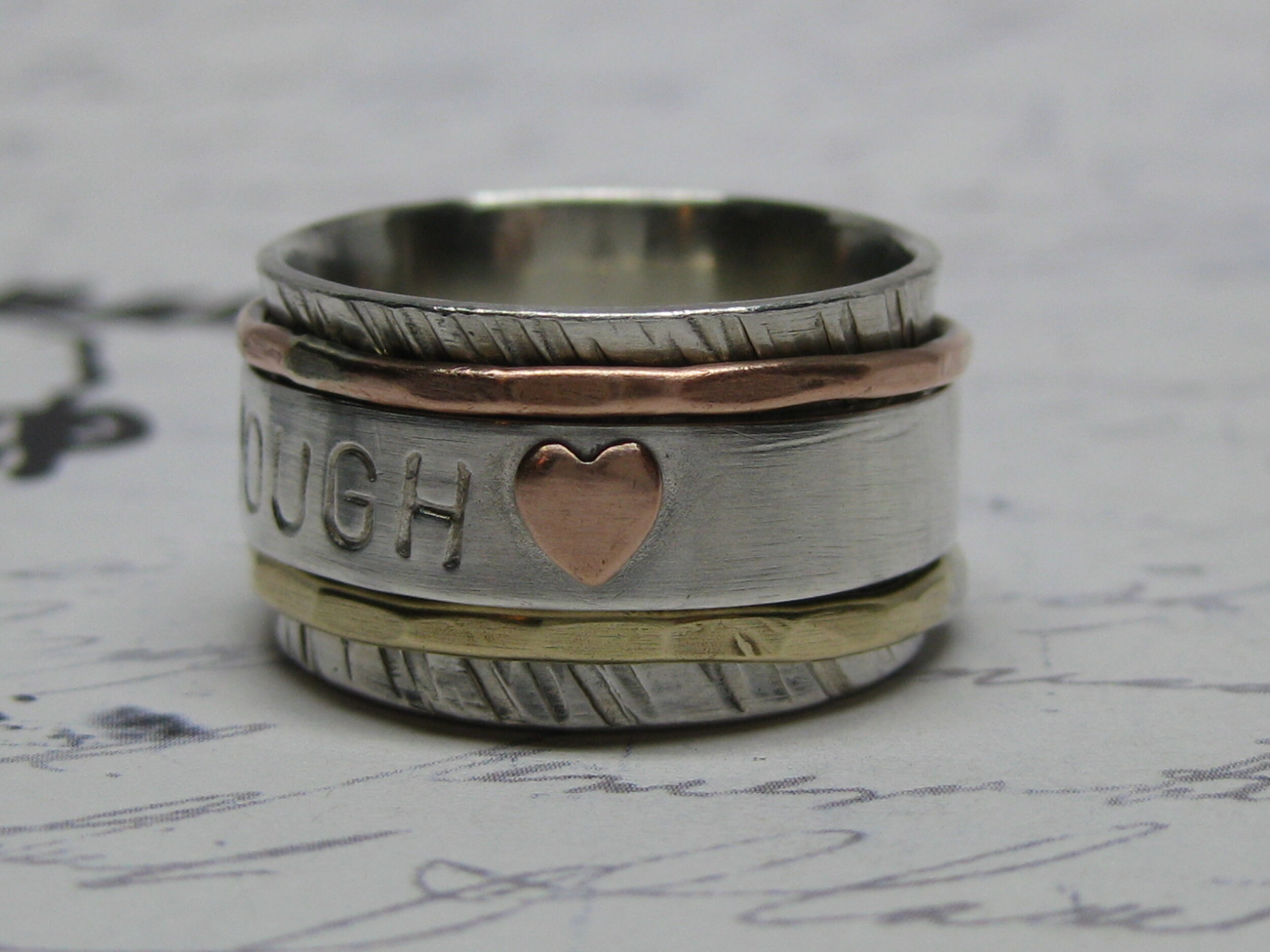 Side 2 of "I am enough" mixed metal spinner ring