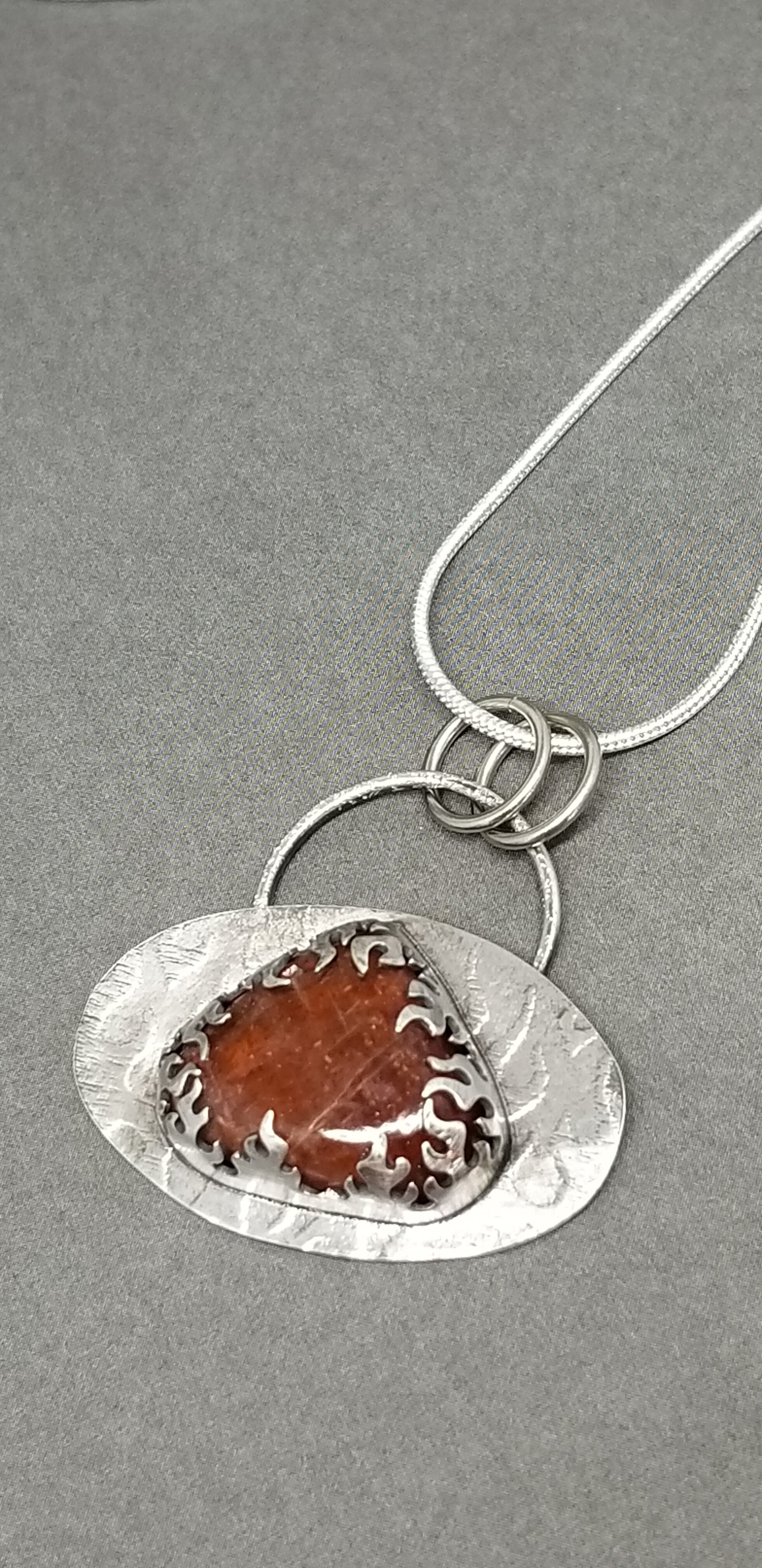 Sunstone in flames on sterling