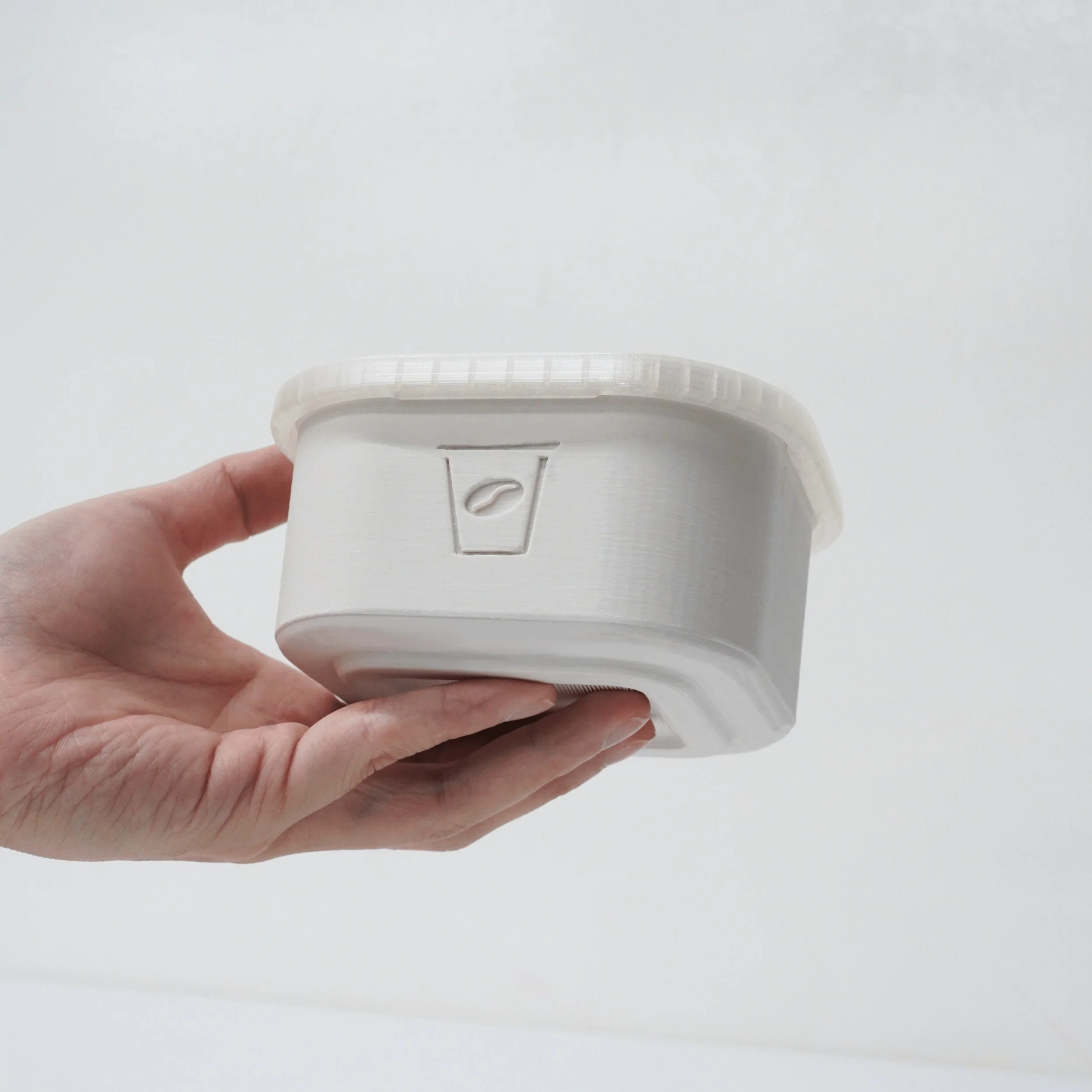 Hand+holding+container+5.jpg
