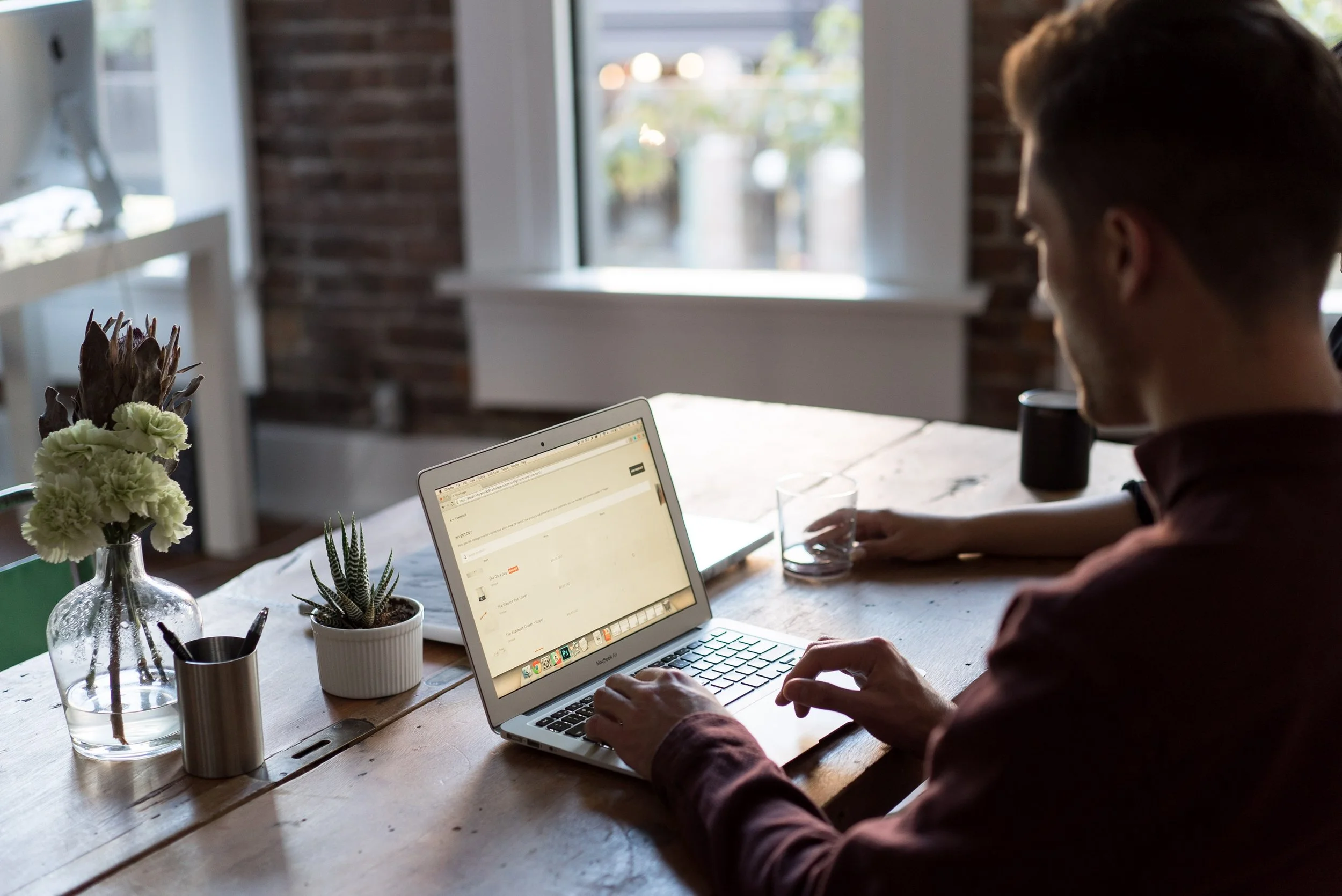 Man looking at home loan on laptop