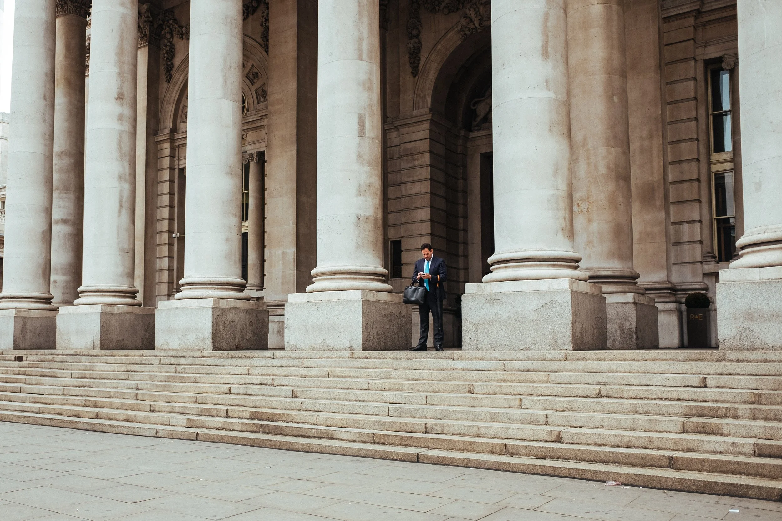 Man standing outside bank