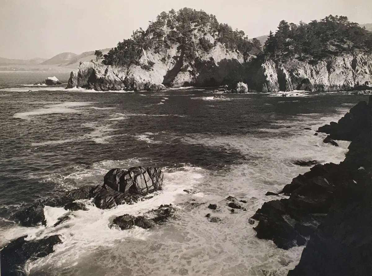 rocky coast line with foam and rocks