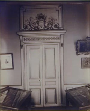 Ornate French Door in white room