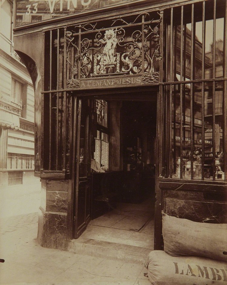 Ornate metal storefront lion crest