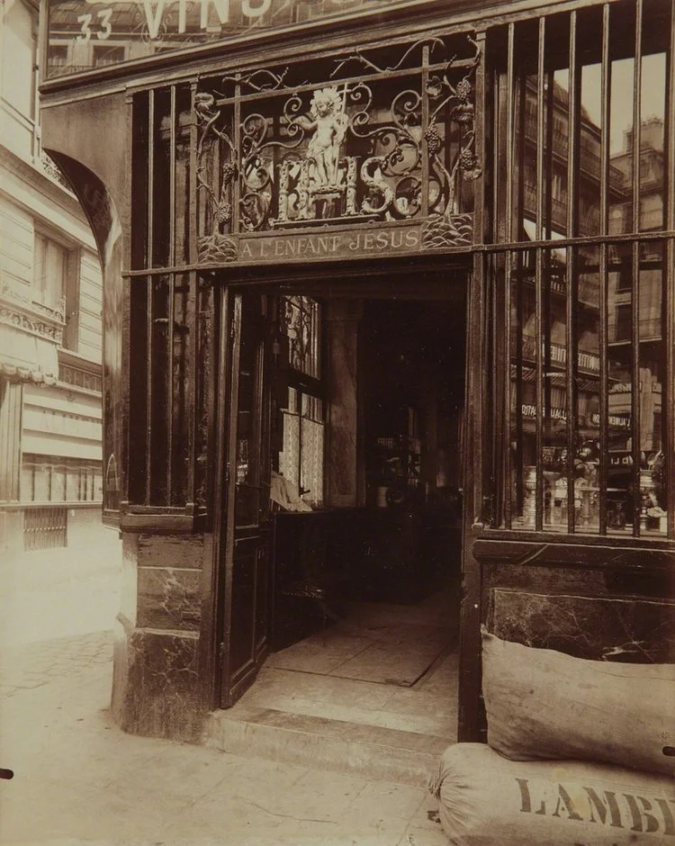 Ornate metal storefront lion crest
