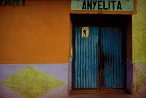 tin double doors orange and pink wall
