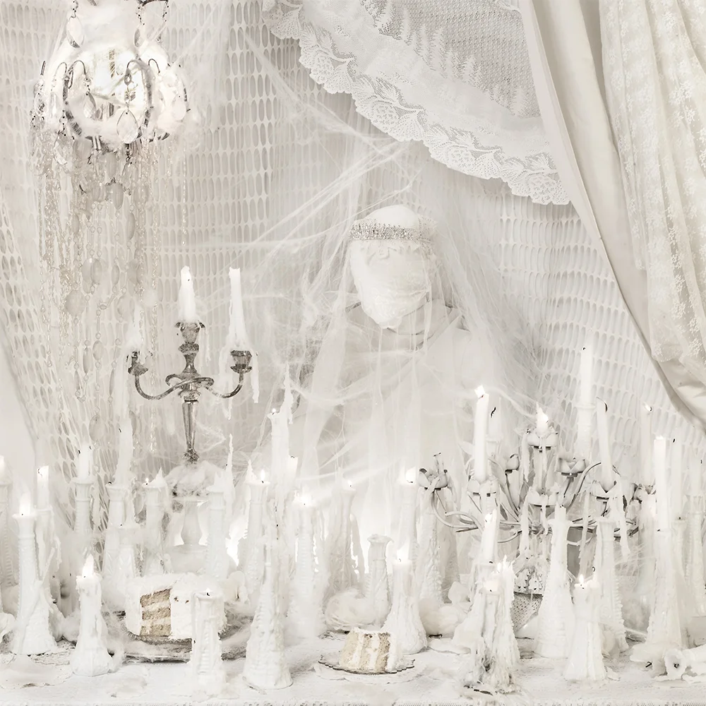 white monochromatic ghostly table candles cobbwebbs candelabra