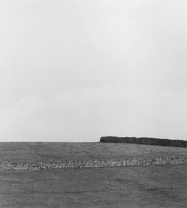 distant stone wall field